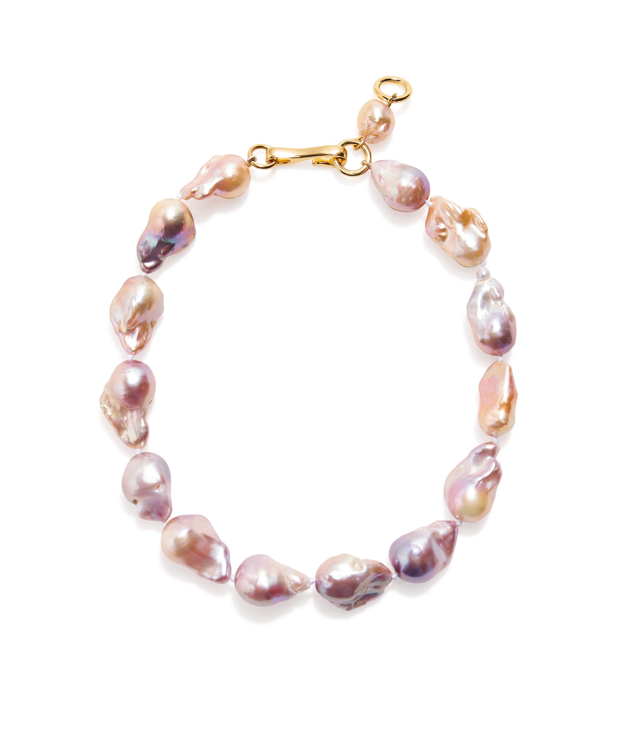 Estate Pearl Necklace In Pink. Single-strand collar of large purple-pink pearls tied with silk knots and gold-plated hook closure