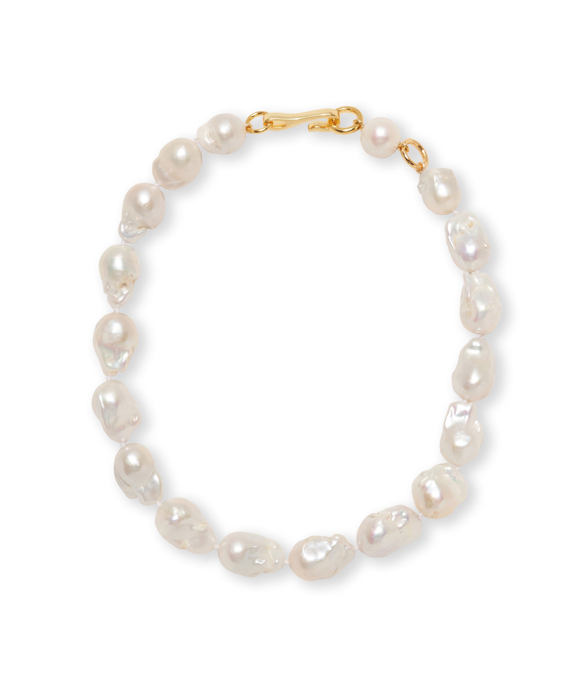 Claude Necklace. Single strand of oversized Baroque pearls with gold-plated closure.