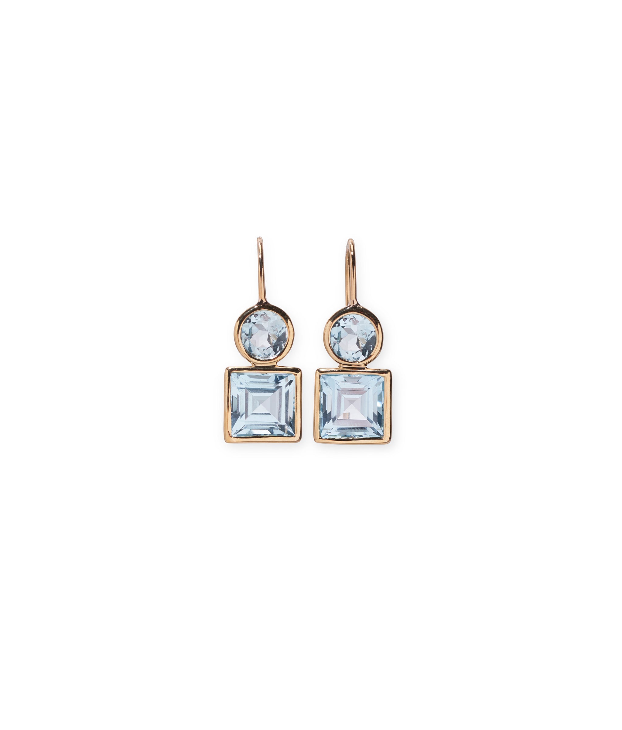 14k Pastille Earrings in Sky Blue Topaz. Fine gold earwires with faceted light blue topaz round and square stones.