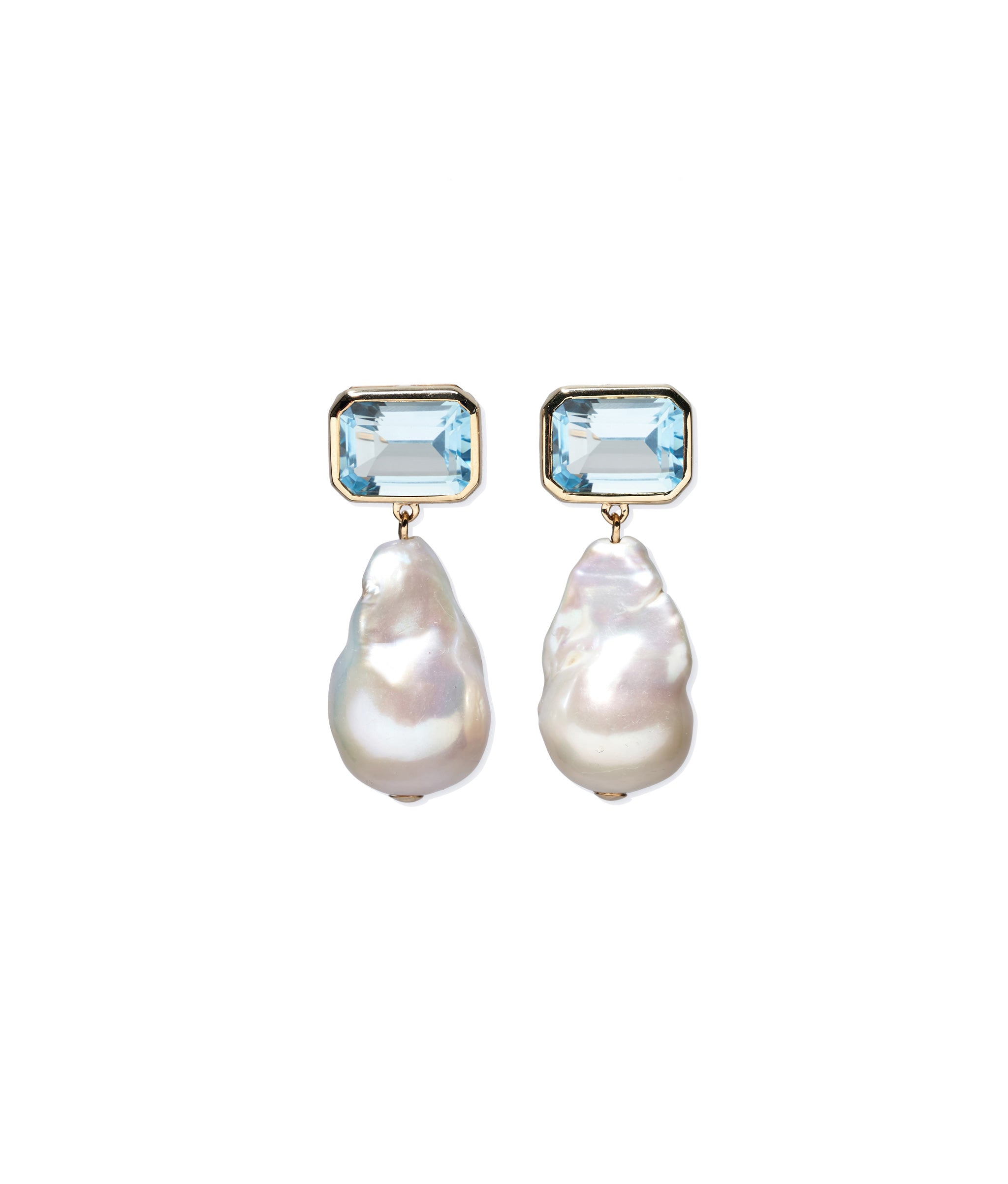 14k Gold Juno Earrings in Sky Blue Topaz on a blank background