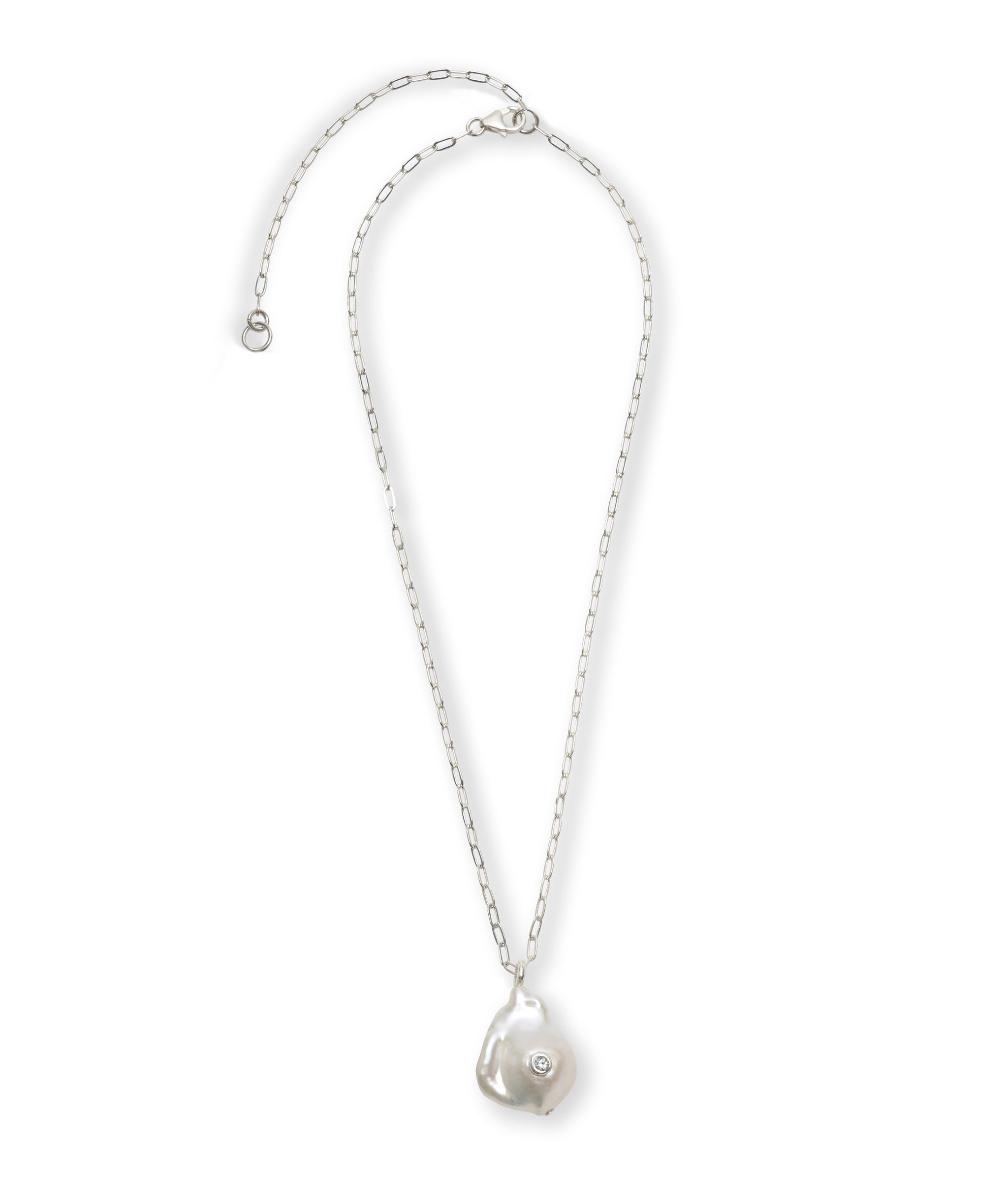 Oasis Necklace in Silver. Delicate silver chain with pearl pendant inlaid with sky blue topaz.