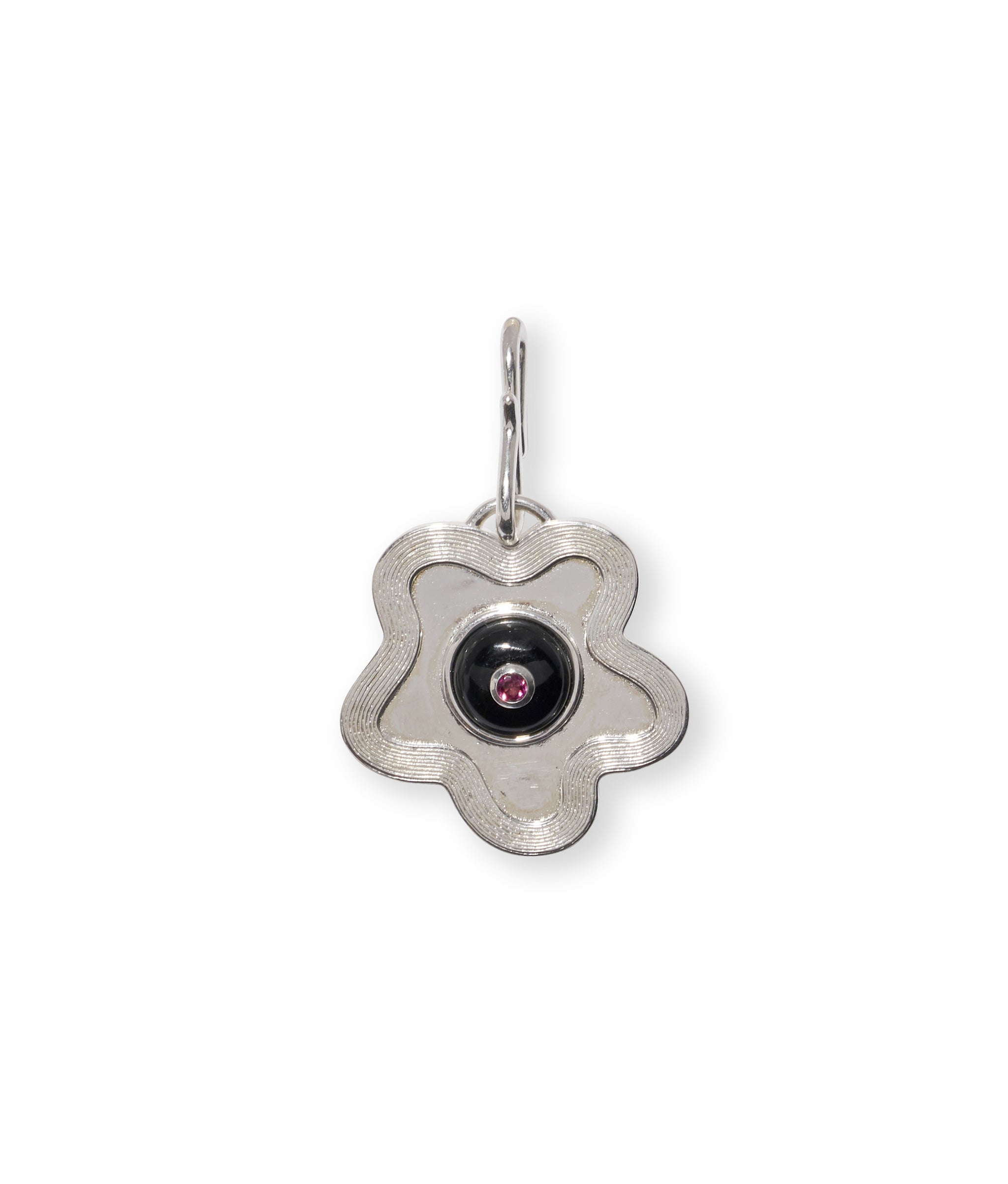 Nana Pendant in Silver. Wavy abstract flower in silver with black agate circle and inlaid rhodolite. S-hook attached.