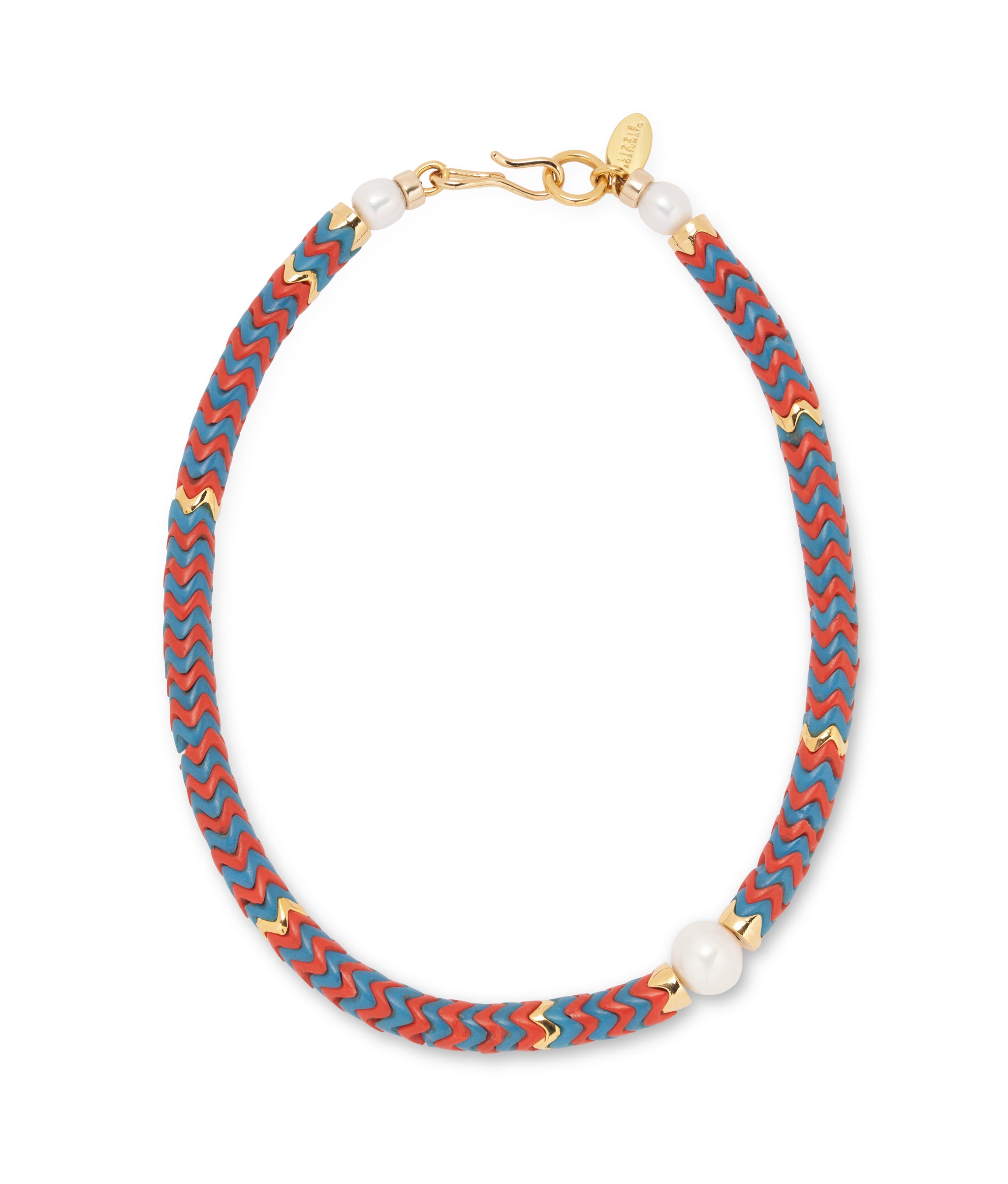 Painted Coast Necklace in Firework. Single strand of interlocking wavy glass beads in red and blue with pearl accents.