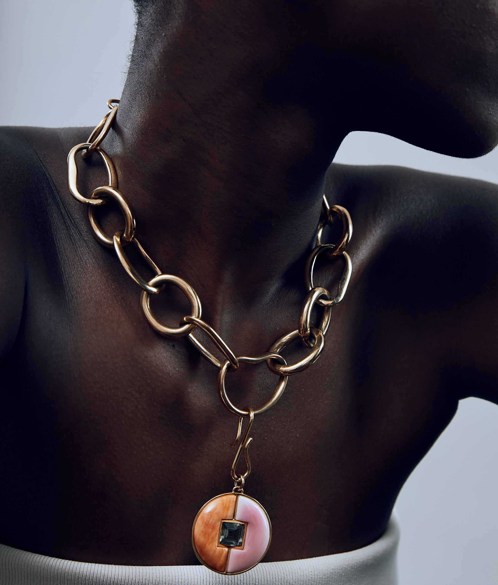 Close-up of model in Porto
Chain and Porto Pendant in Sorbet.