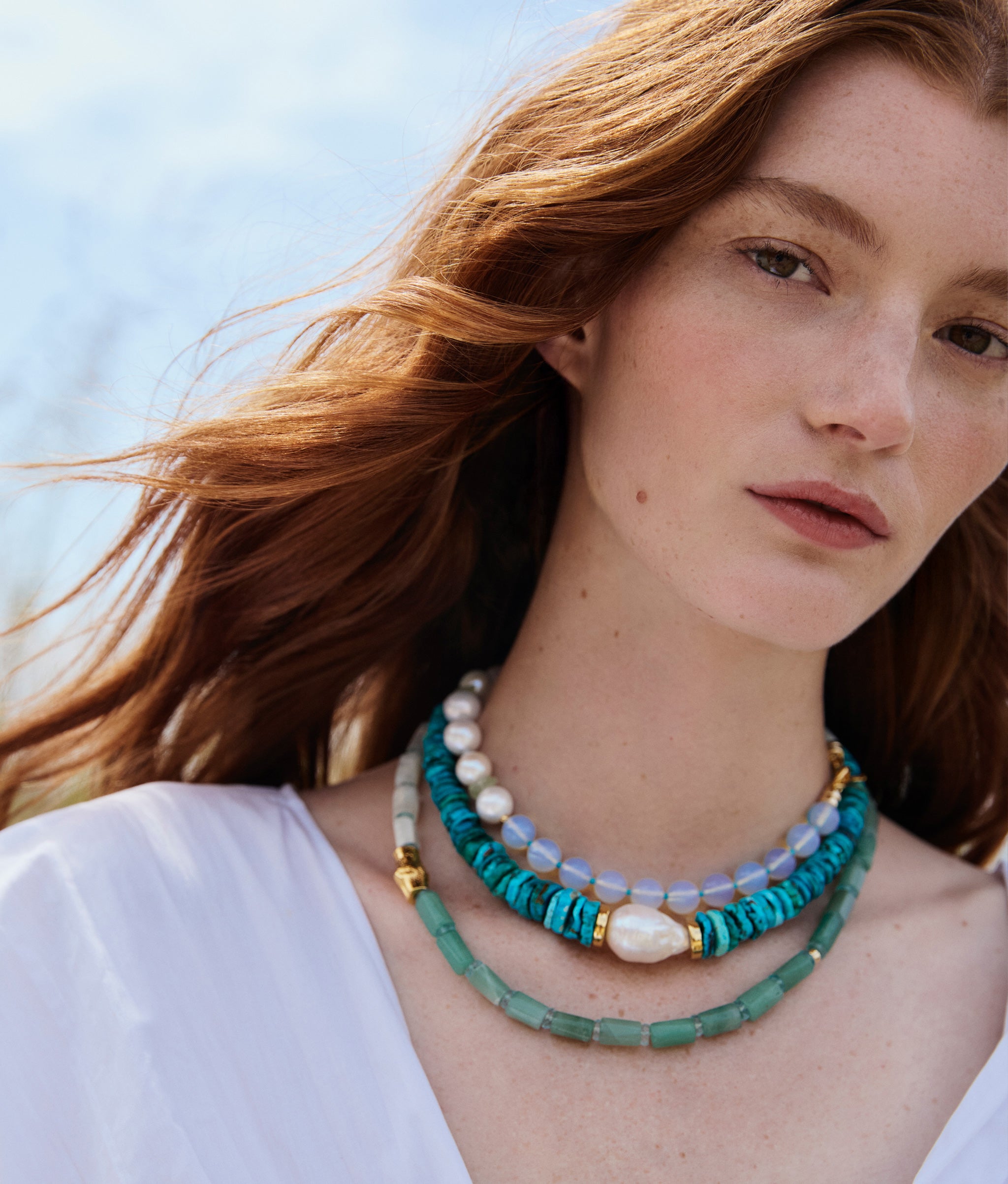 Model wears Cabana Necklace in Tide Pool and Sky Stone Necklace