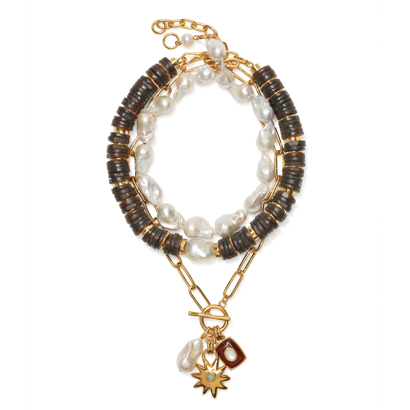Flatlay with Claude Necklace, Bilbao Collar, and Helios Charm Necklace