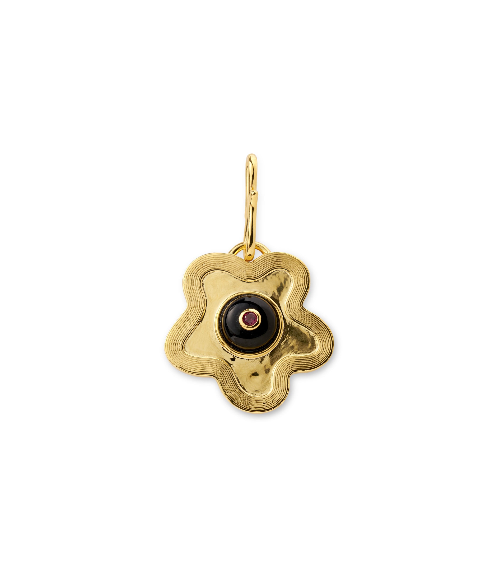 Nana Pendant in Black Daisy. Gold-plated brass etched daisy with onyx cabochon, inlaid with pink rhodolite.