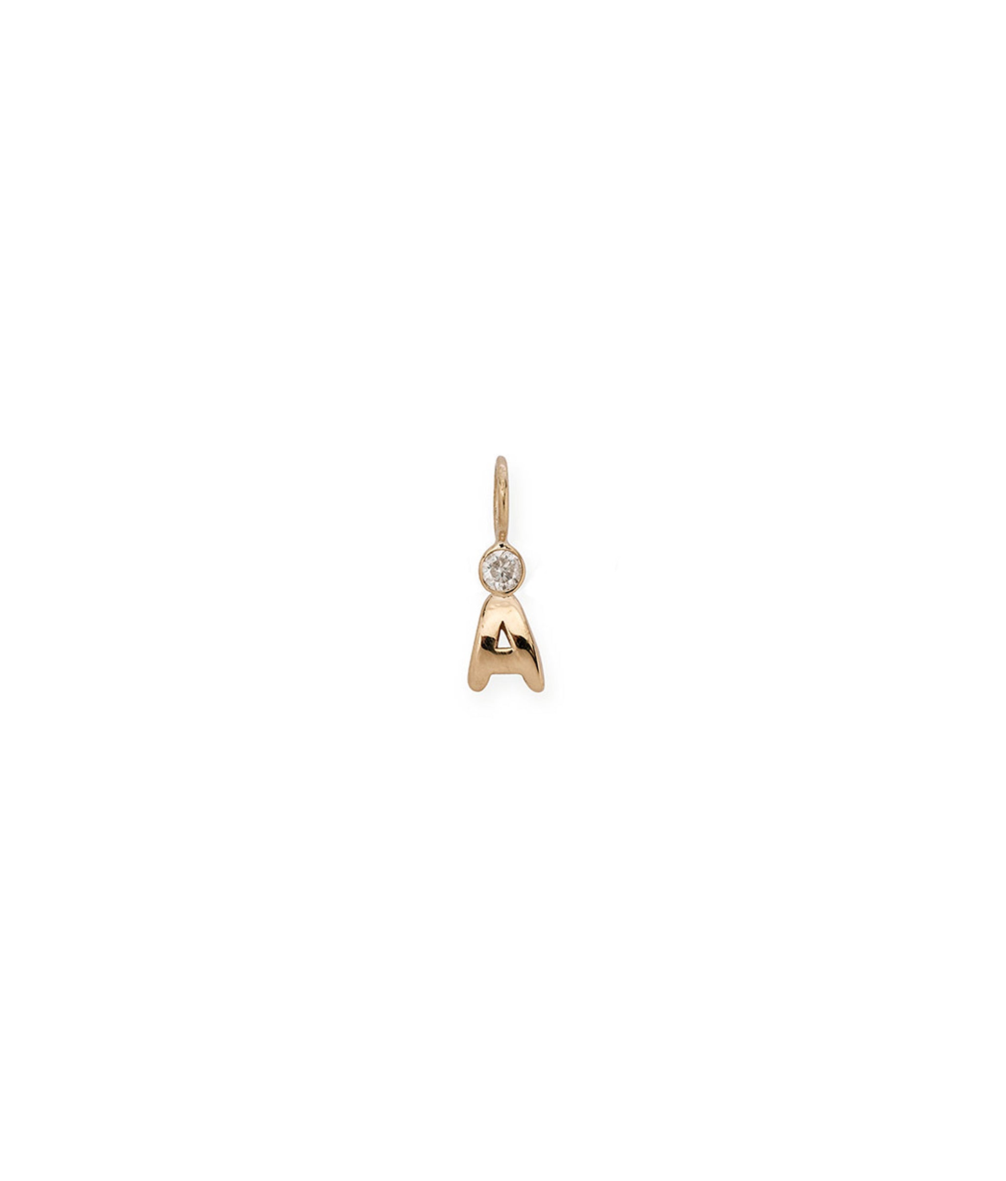 Alphabet Soup "A" Charm. Puffy mini 14k gold letter "A" charm with round diamond accent.
