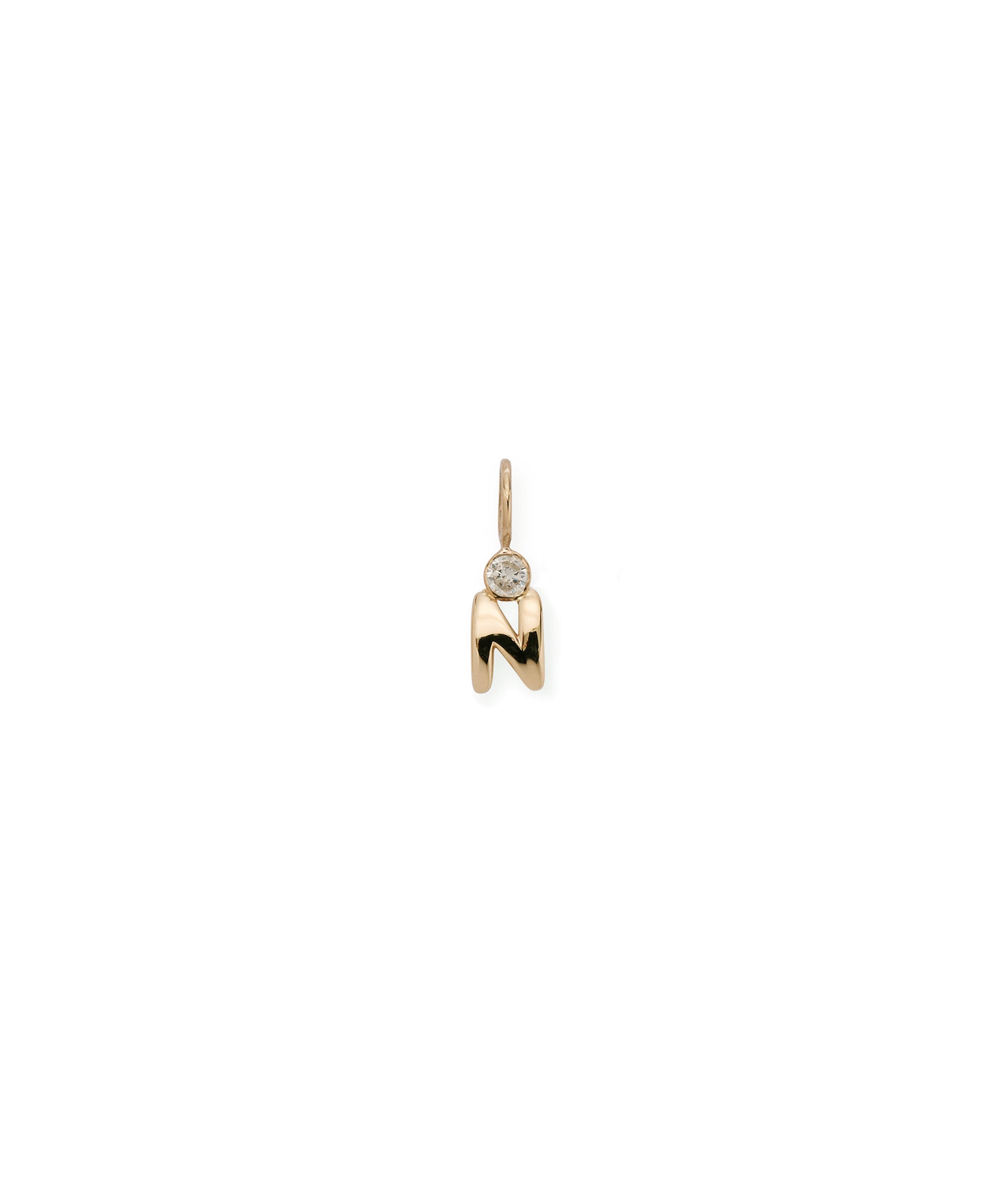 Alphabet Soup "N" Charm. Puffy mini 14k gold letter "N" charm with round diamond accent.