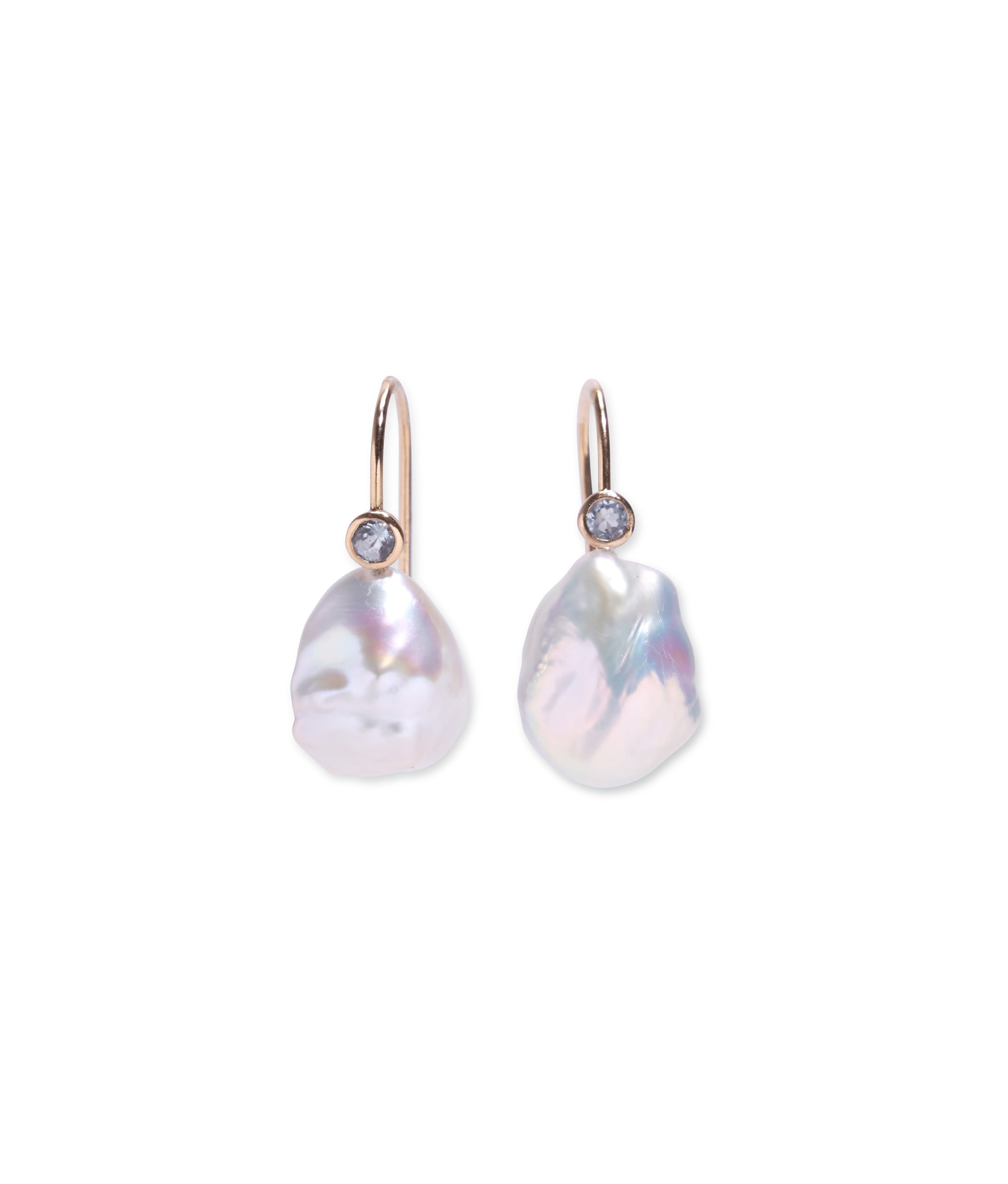 14k Gold Claude Earrings in Pearl & Sky Blue Topaz. 14k gold with freshwater Keshi pearl drops and blue topaz details.