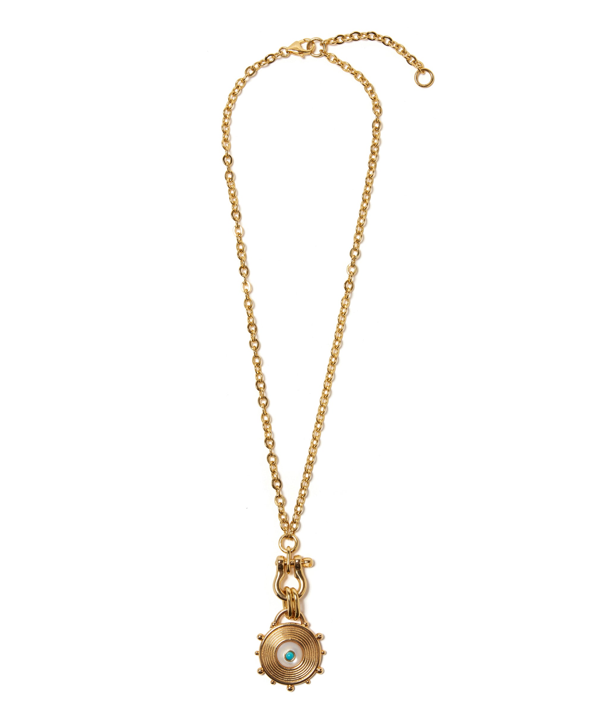 Helm Necklace in Pearl. Gold-plated chain with ridged wheel-shaped pendant inset with mother-of-pearl and turquoise