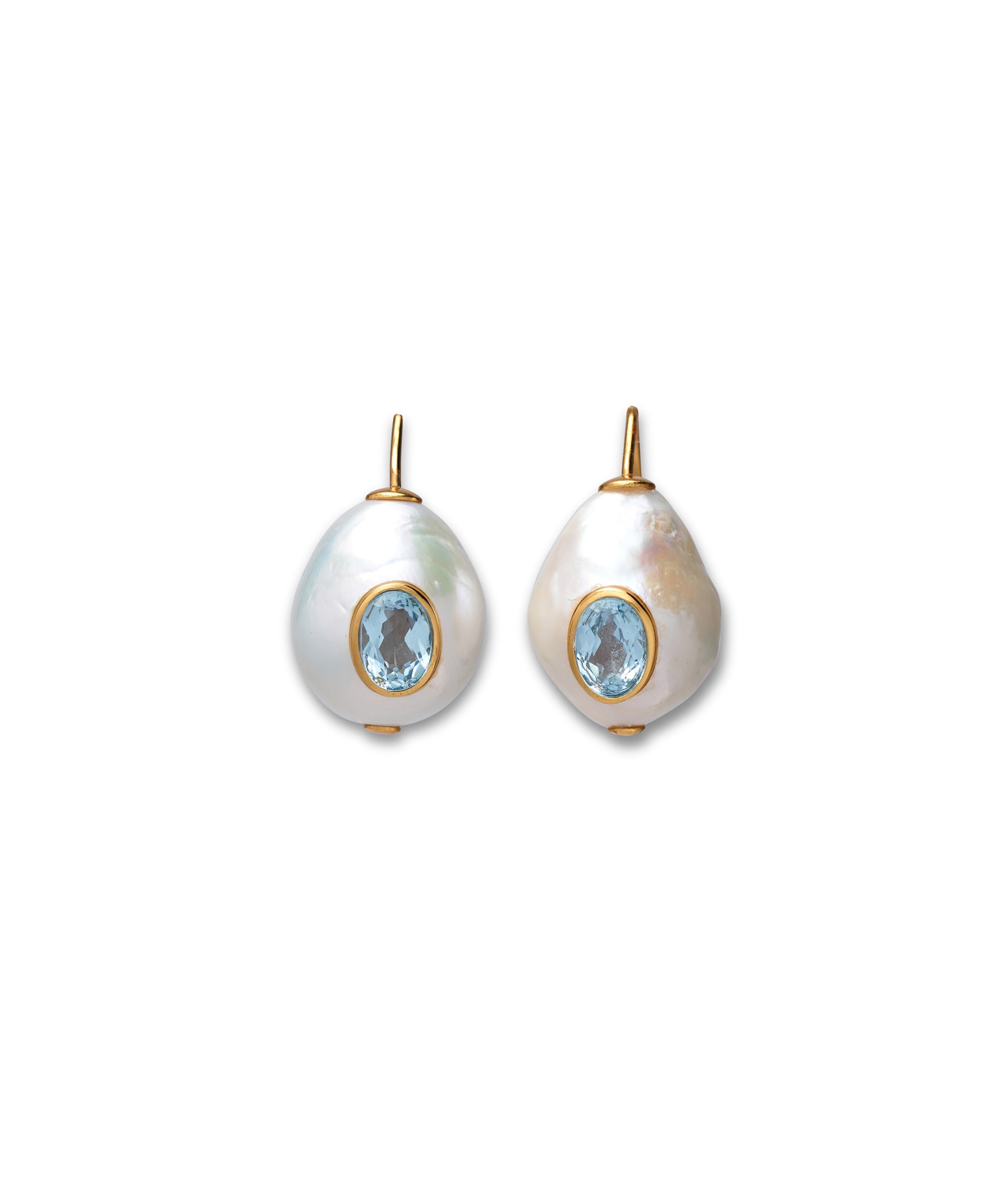 Pearl Pablo Earrings in Blue Topaz. Gold ear wires with freshwater pearl drops inlaid with faceted sky blue topaz stones.