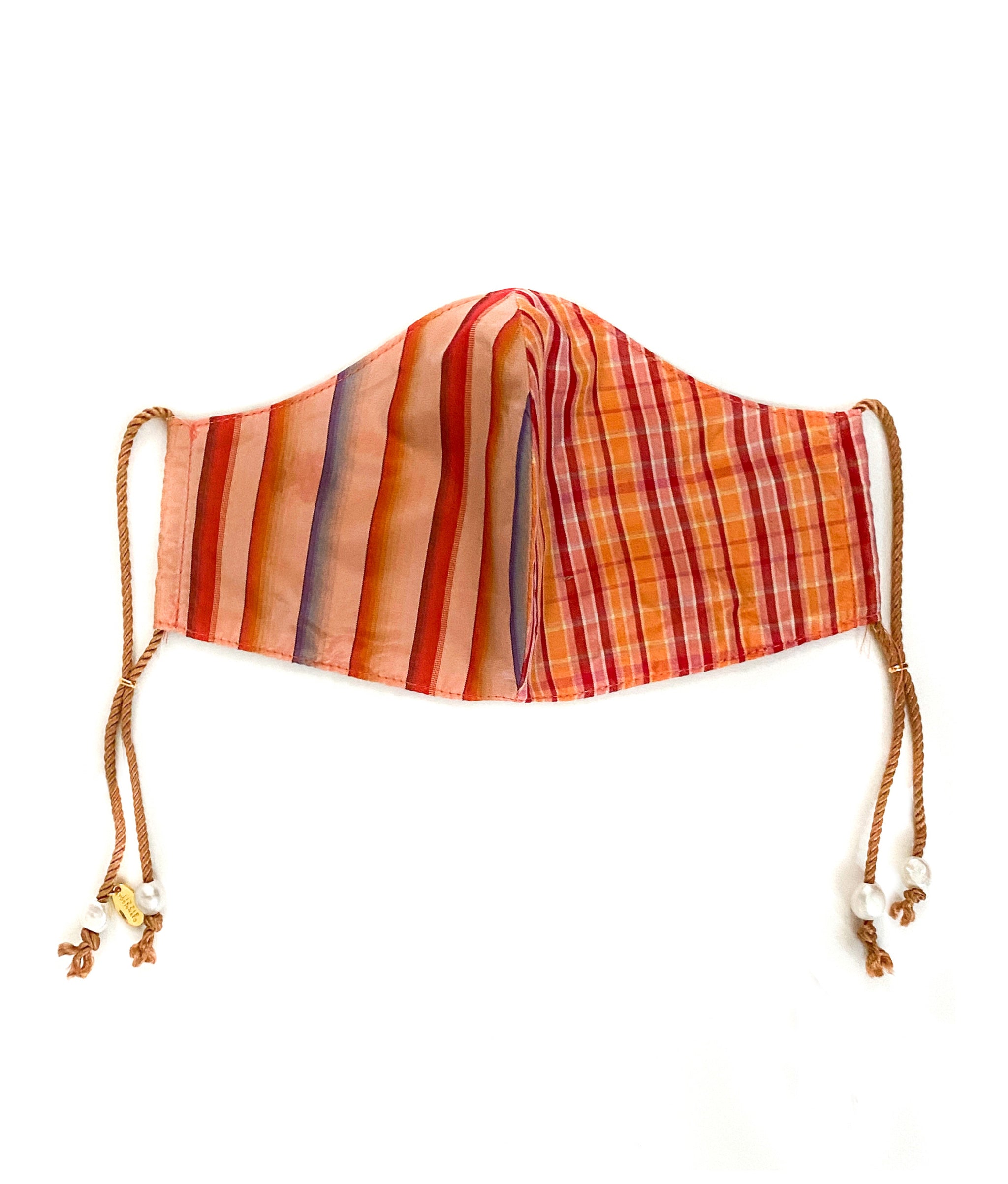 Face Mask in Golden Hour. Multicolor striped cotton and plaid silk mask with tan cord straps and freshwater pearl details.