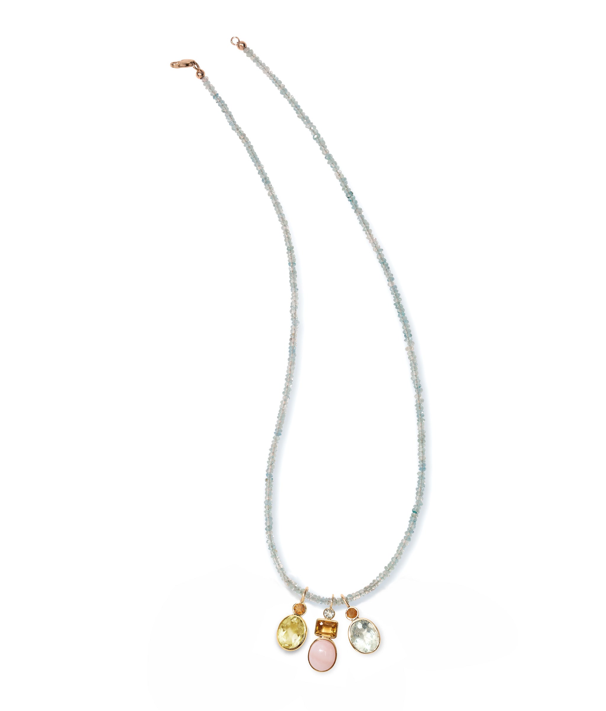 Tiny Aquamarine & 14k Gold Necklace with assorted semiprecious and gold charms attached.