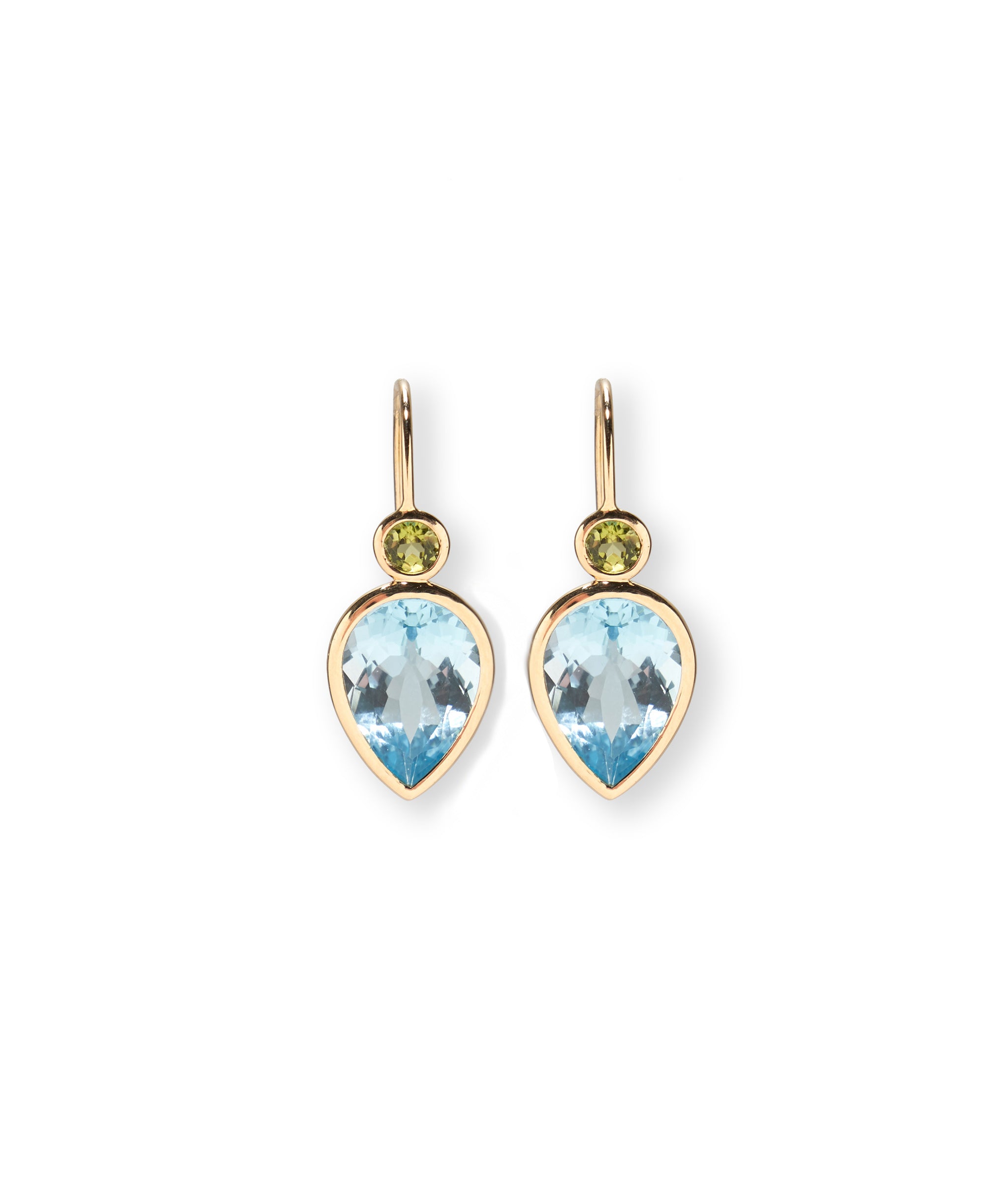 Hera Earrings in Sky Blue Topaz. Faceted pear-shaped sky blue topaz stones, enrobed in 14k gold bezels.