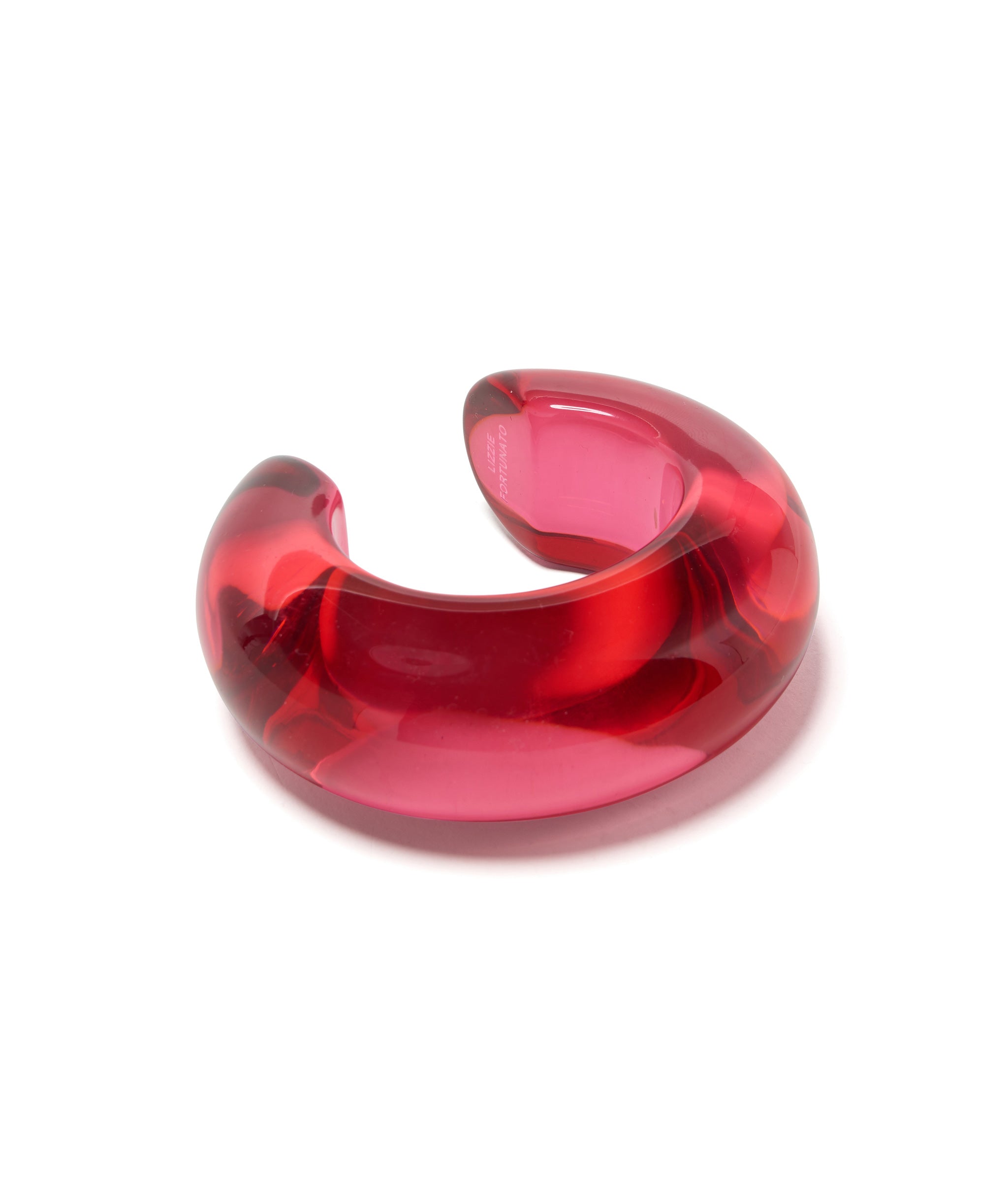 Arc Cuff in Magenta. Chunky bracelet made of hot pink-hued resin.