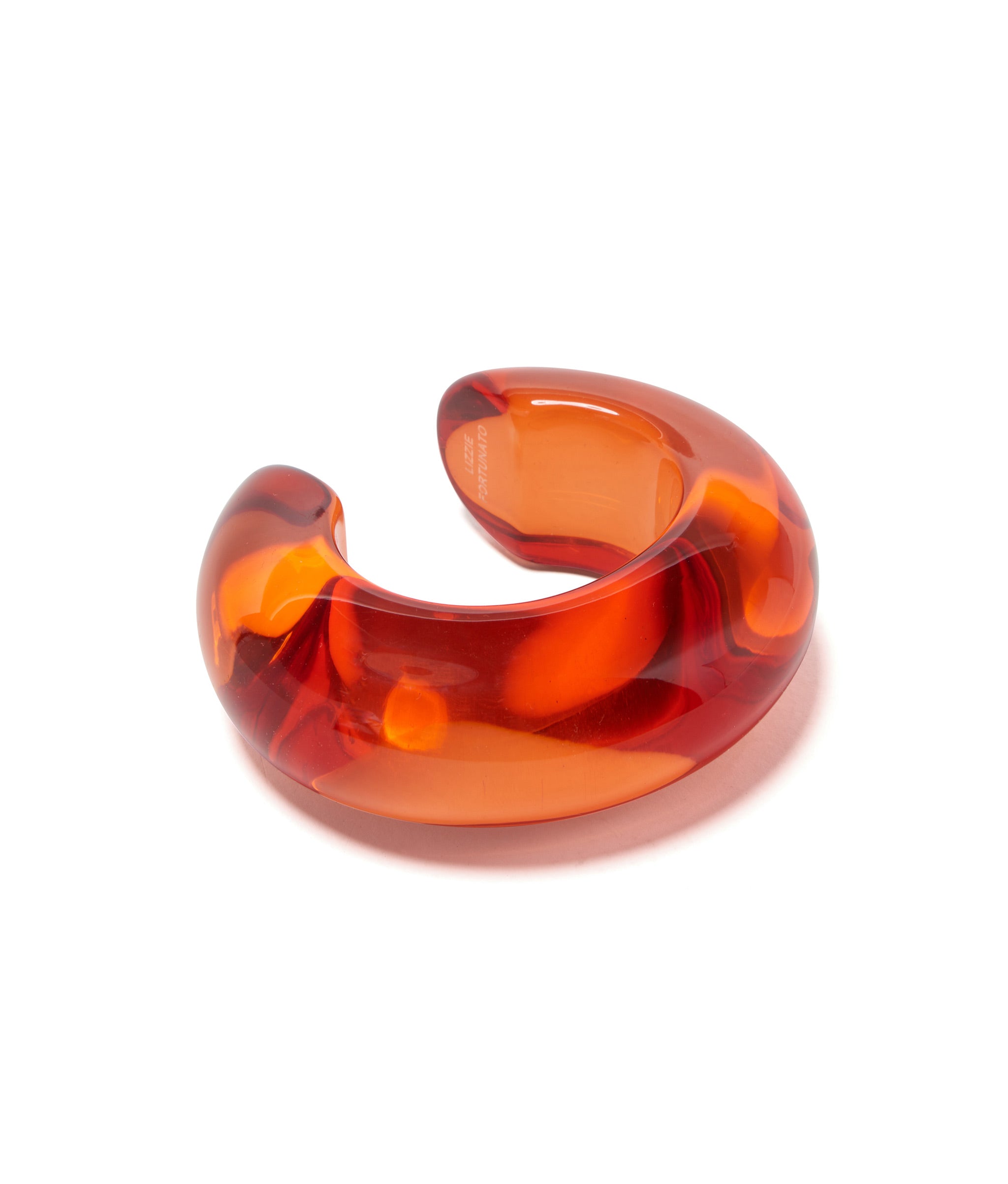 Arc Cuff in Persimmon. Chunky bracelet made of orange-hued resin.