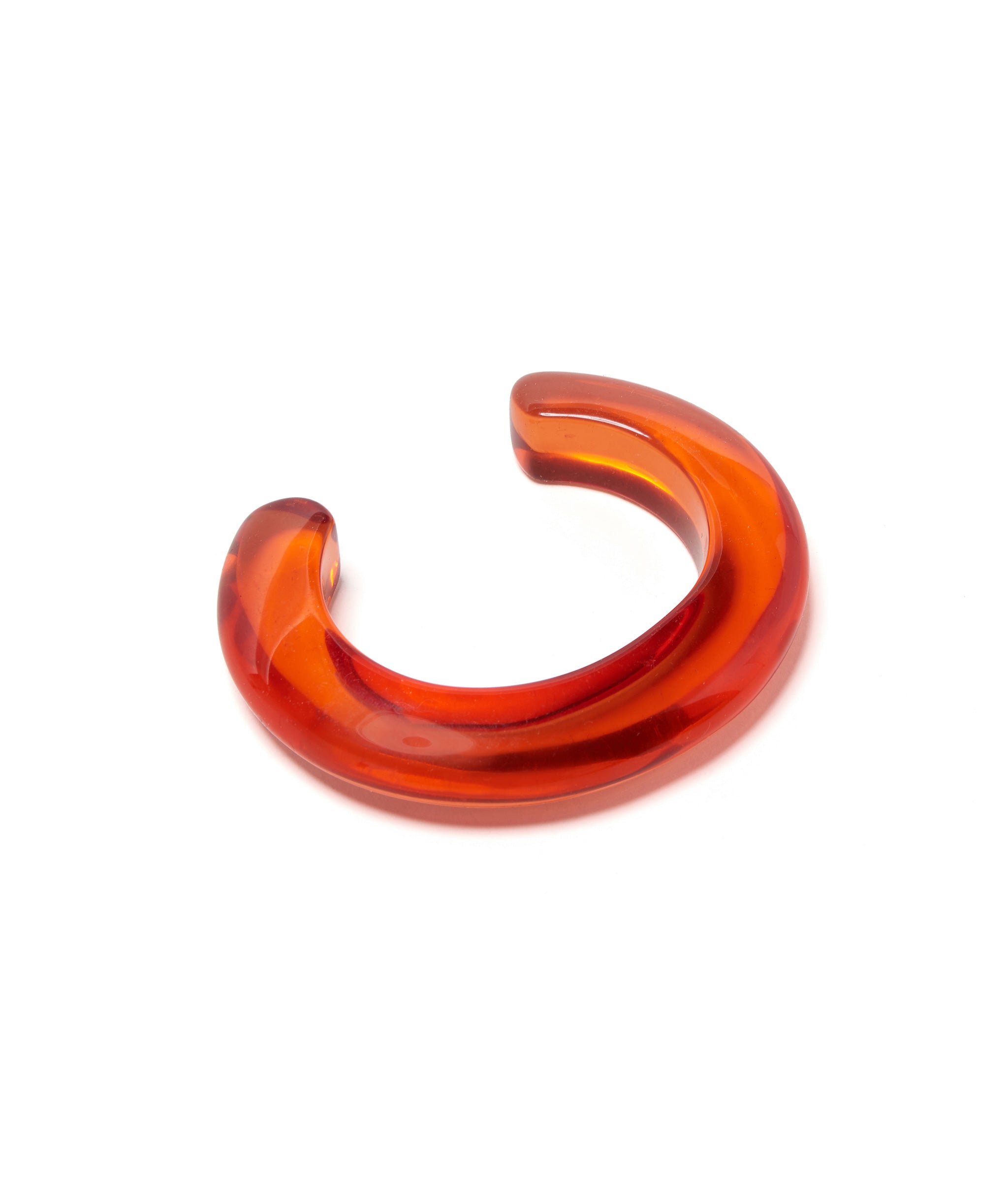 Ridge Cuff in Persimmon. Thin domed cuff bracelet made of juicy orange-hued resin.