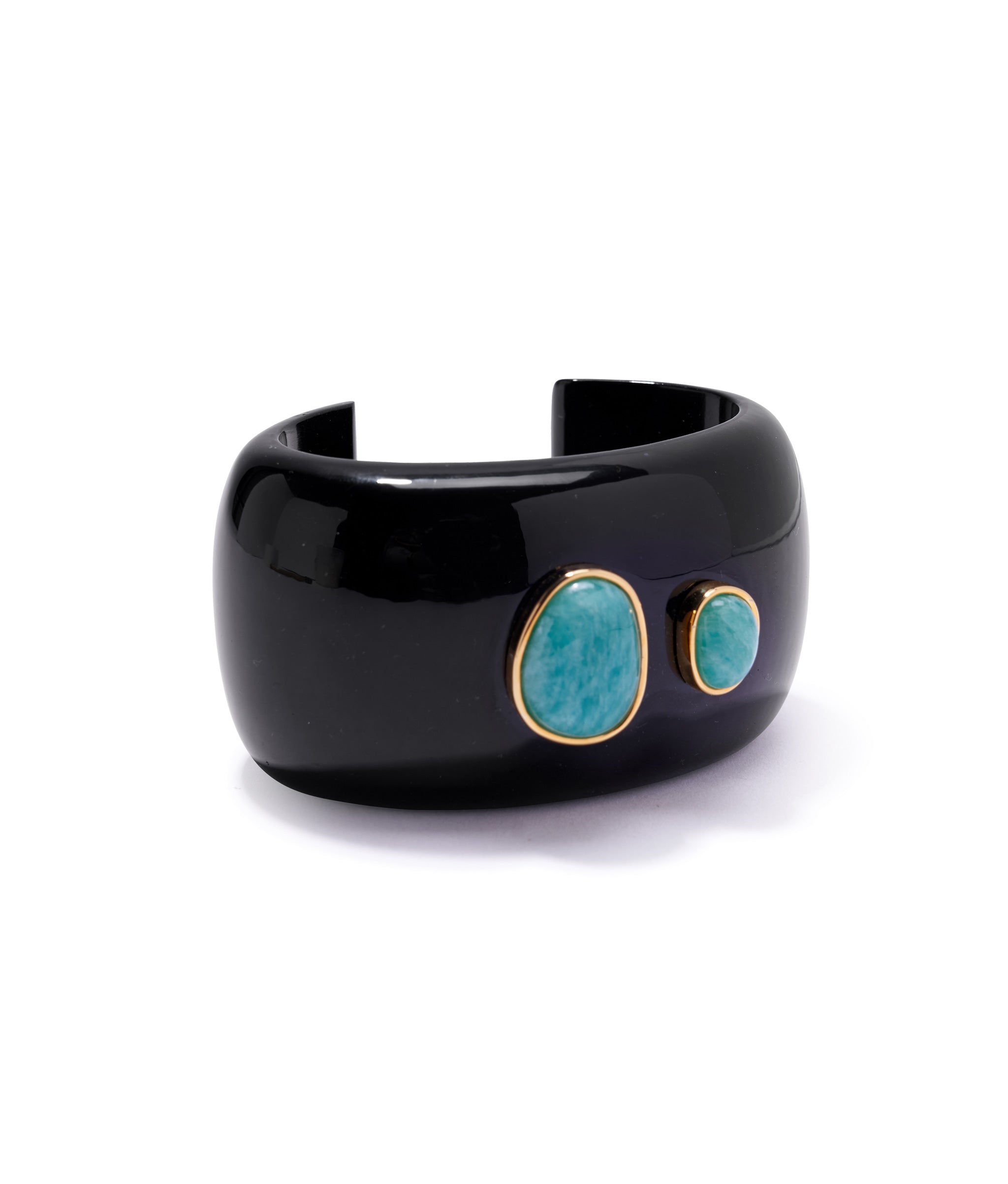 Lanna Cuff in Black. Wide black resin bracelet with gold-plated brass bezels inlaid with two amazonite stones. 
