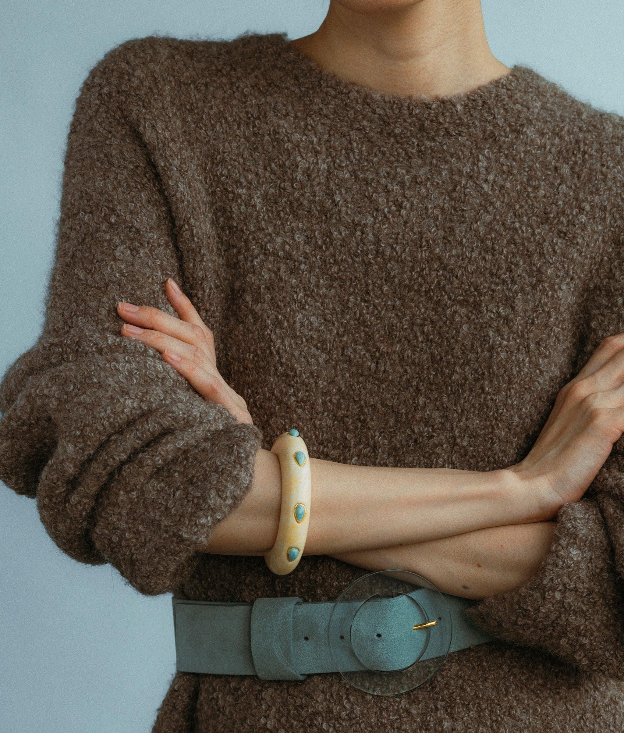 Close-up of model wearing Ridge Cuff In Alabaster 