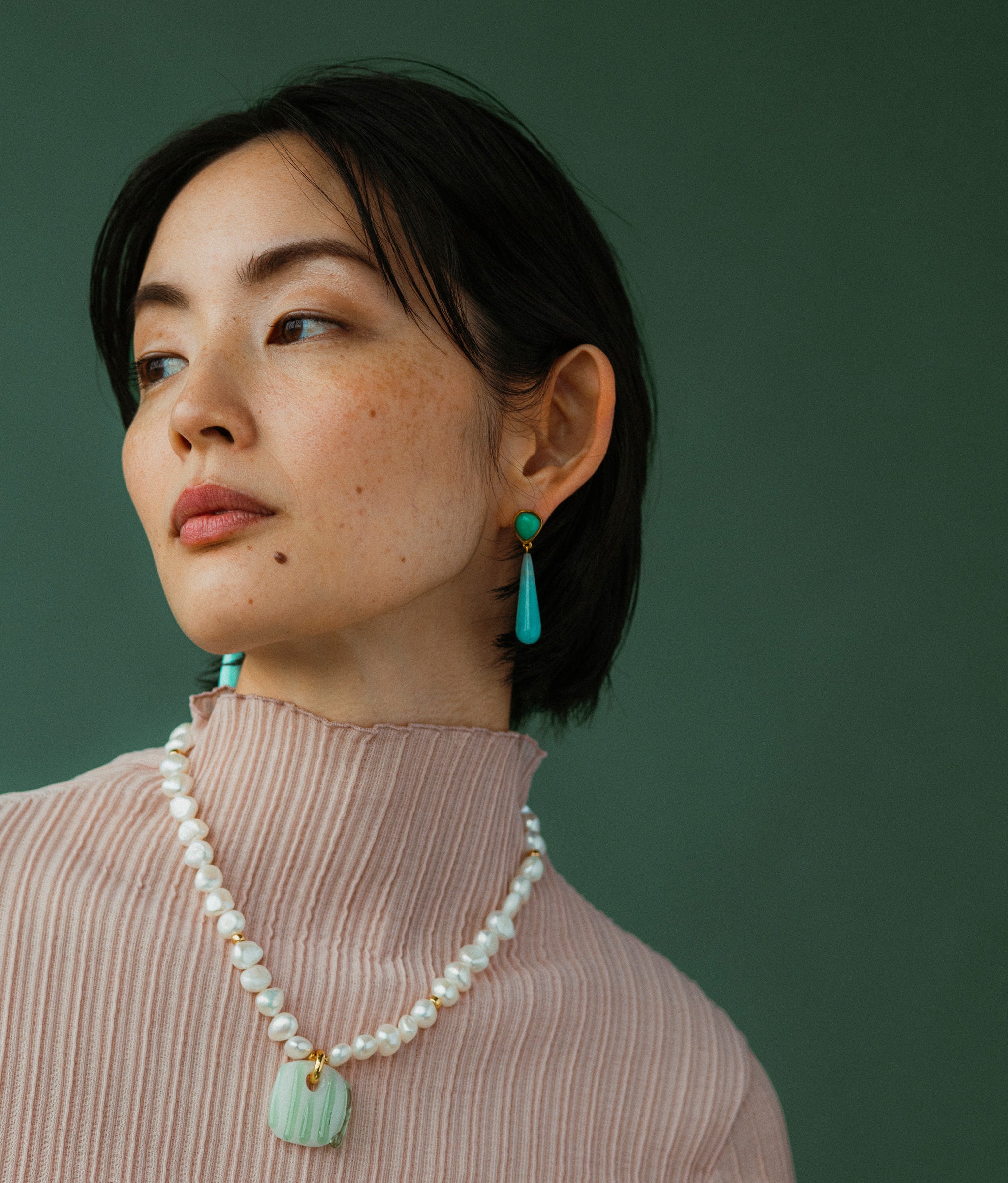 Model wears Alaria Drop Earrings with Marine Glass Necklace.