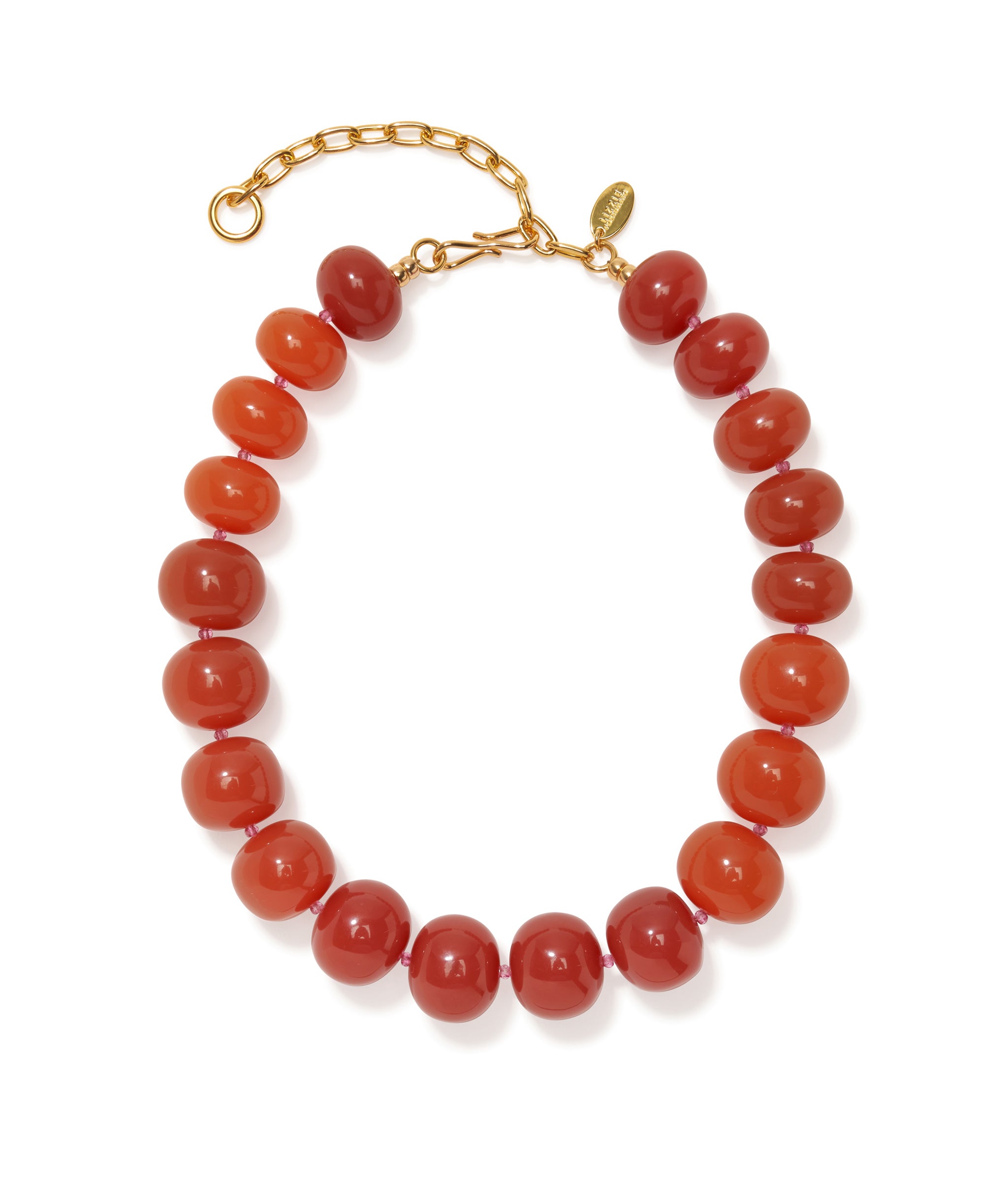 Olympia Collar In Spice an ombré red and orange-colored resin bead collar, with pink crystal accent beads.