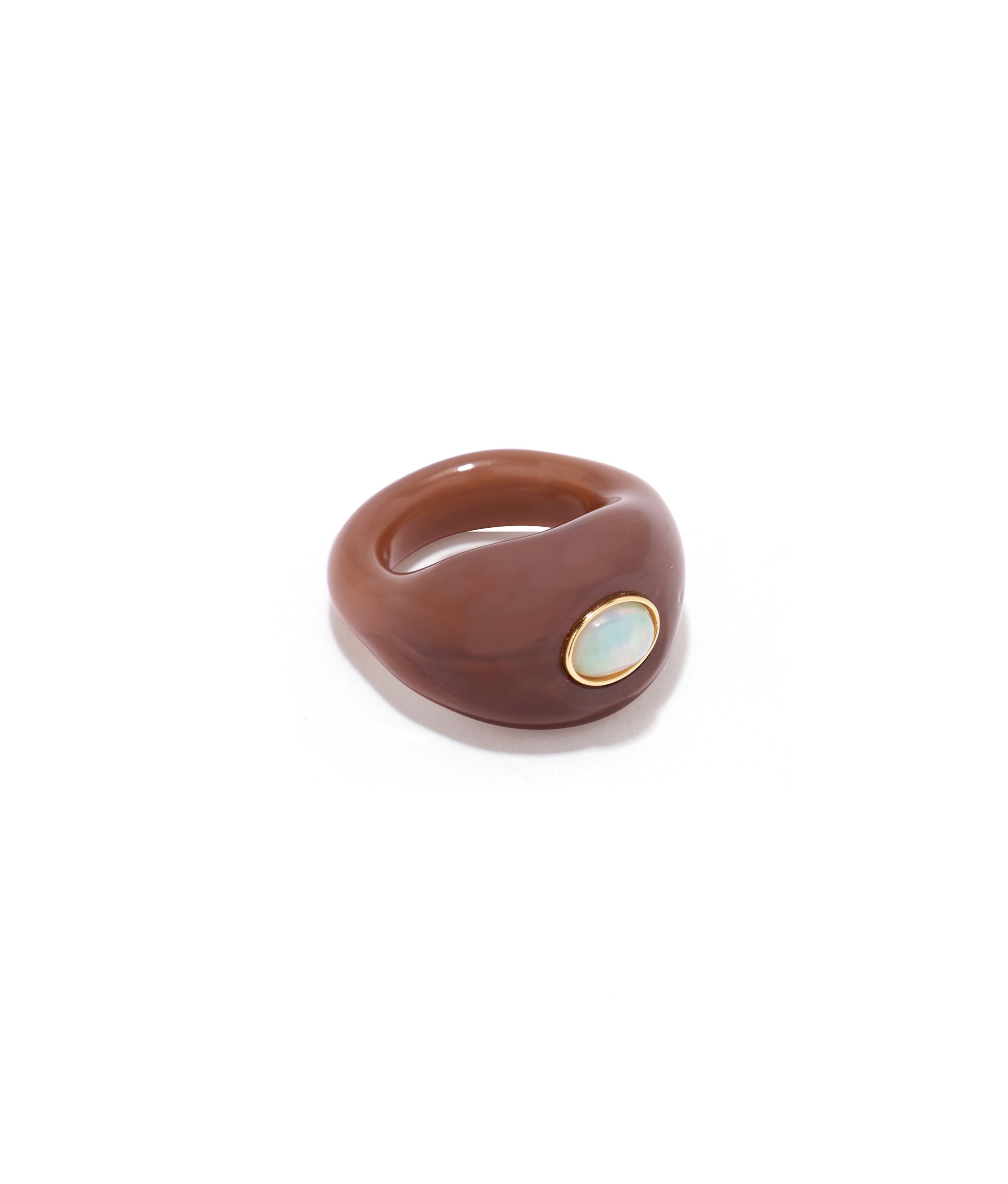 Monument Ring in Sandstone. Domed glass ring in mocha brown, inlaid with opal cabochon.