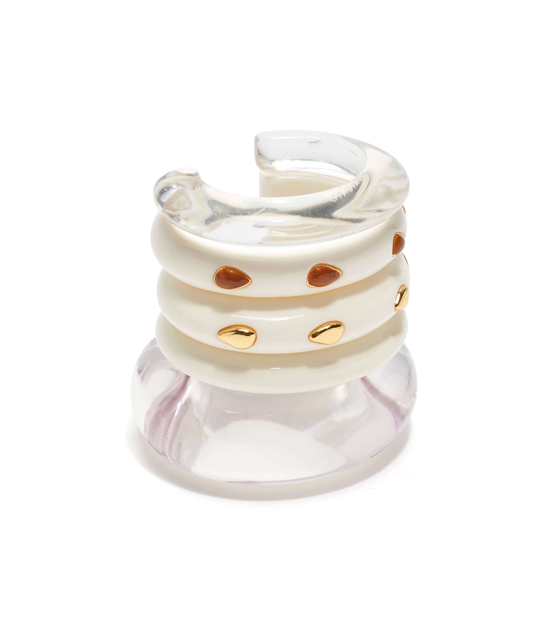 Stack of cuffs- Ridge Cuff in Alabaster, Ridge Cuff in Alabaster and Amber and Ridge Cuff in Alabaster and Gold Stud. 