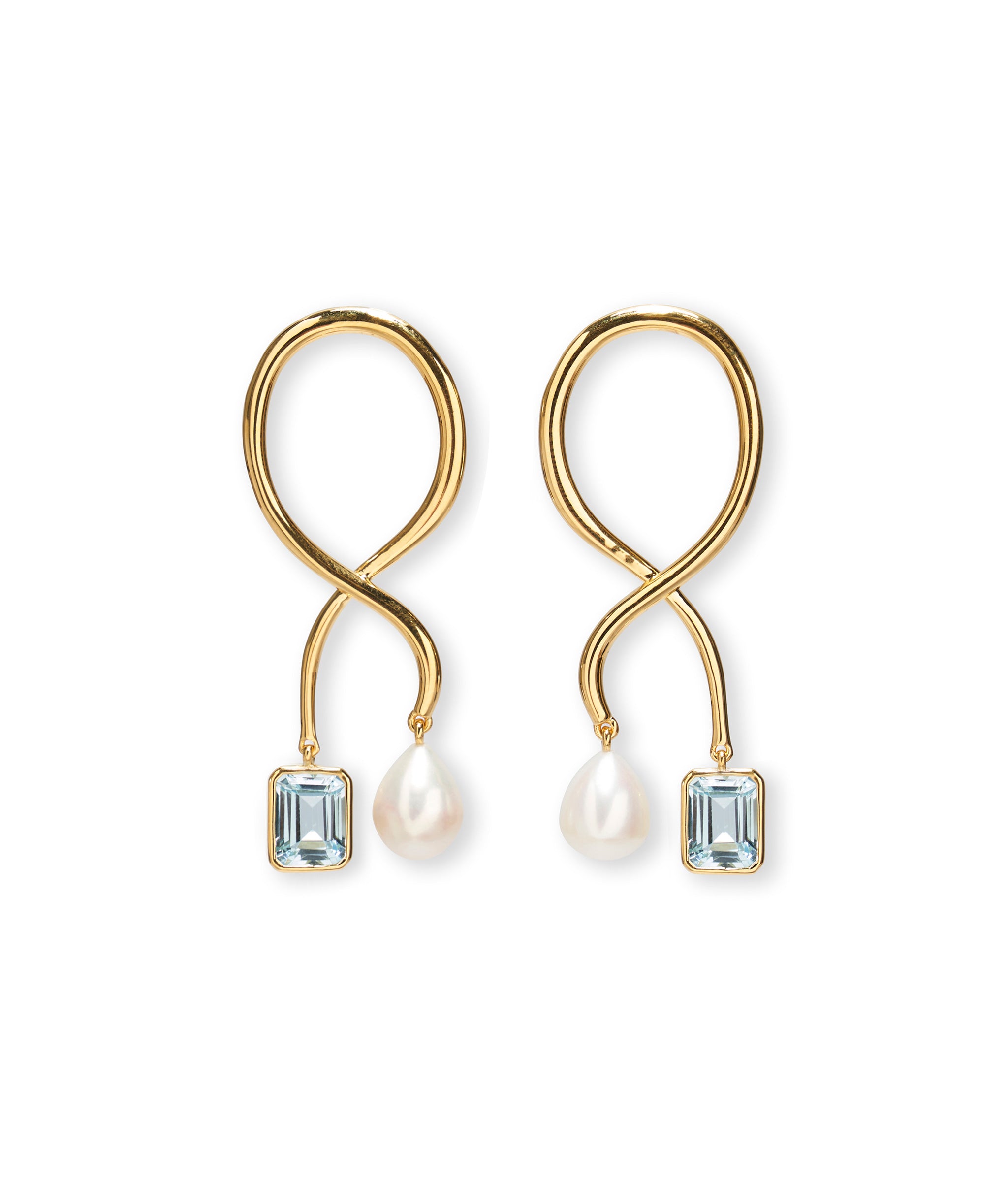 Etienne Earrings are gold-plated sculptural beauties, gracefully capped off with blue topaz and freshwater pearl drops.