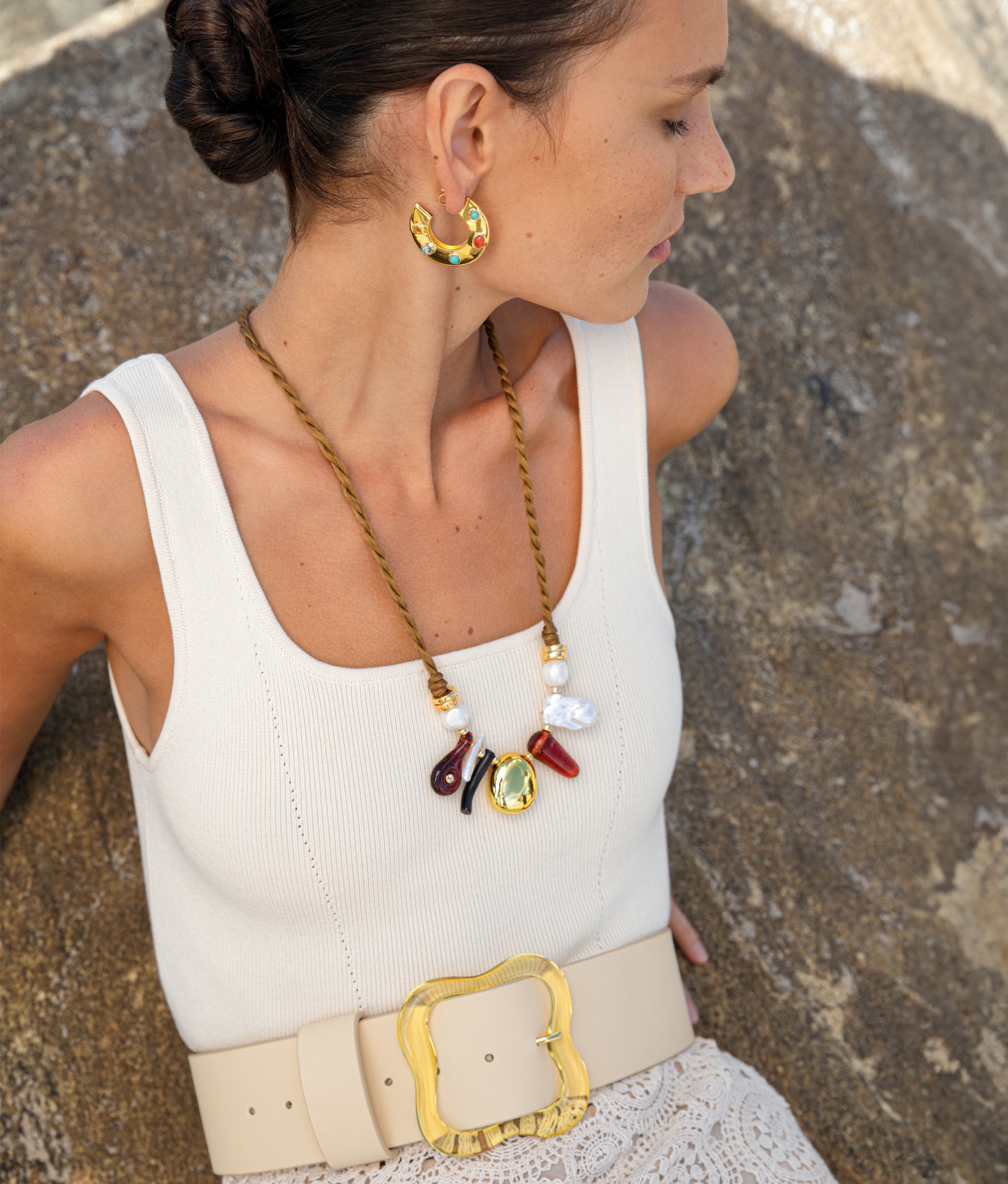 Model wears Florence Belt in Limoncello paired with Olive Branch Necklace and Saucer Hoops in Dotted Stone.