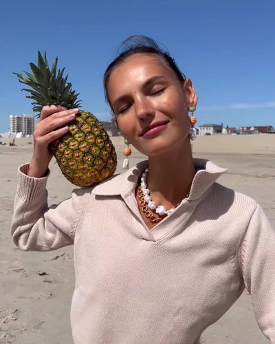 Video of model wearing Formentera Necklace paired with Mandarina Drop Earrings and Mood Necklace in Gold.