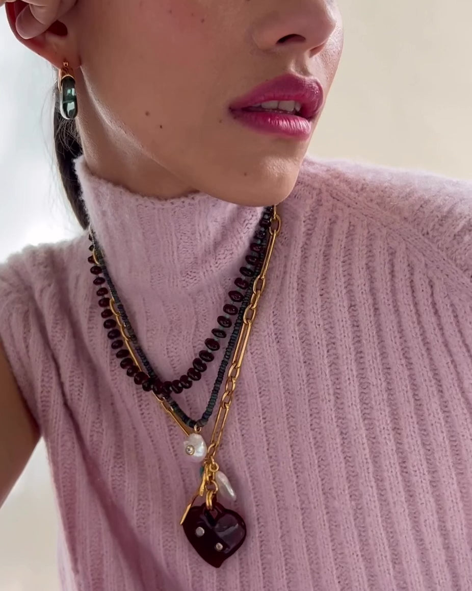 Video shows a close-up of Castillo Necklace in Black Opal styled with Eugenia Lariat Necklace.