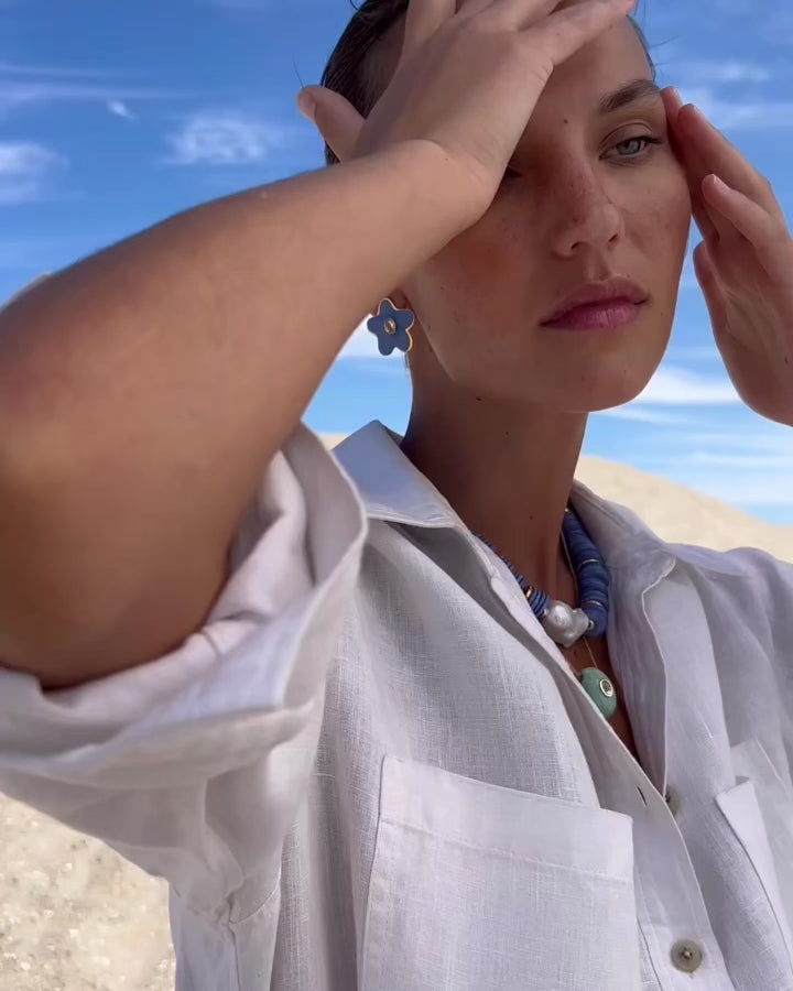 Video of model wearing Camilo Stud Earrings in Periwinkle, Bilbao Collar in Marine and Constance necklace in Amazonite.