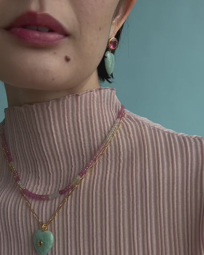 Close-up video with model wearing Lamai Heart Necklace