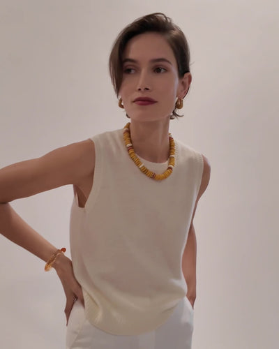Video of model wearing white tank with Laguna Necklace in Mustard and Organic Hoops