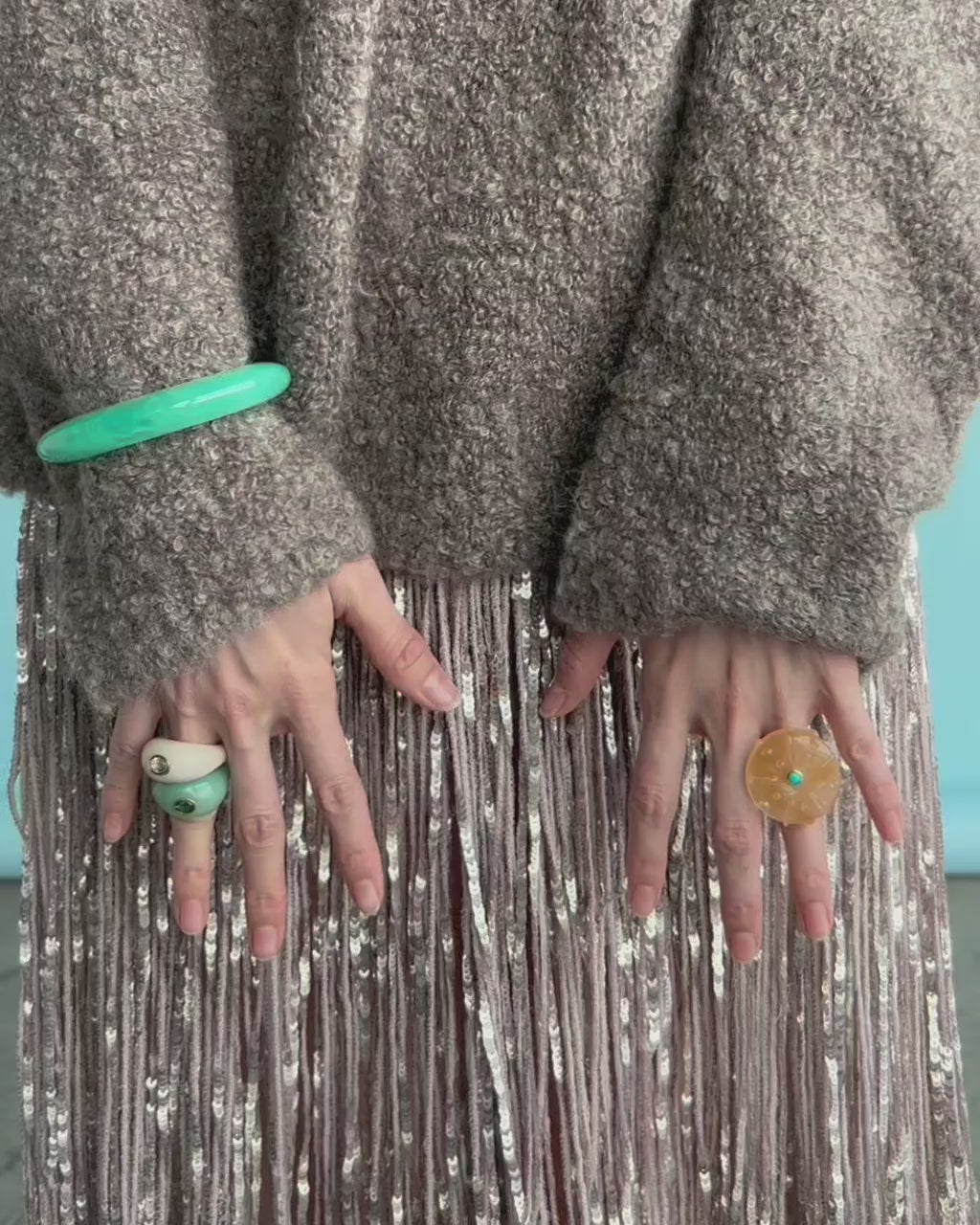 Video shows a close-up of Ridge Cuff in Jade Green styled with rings.