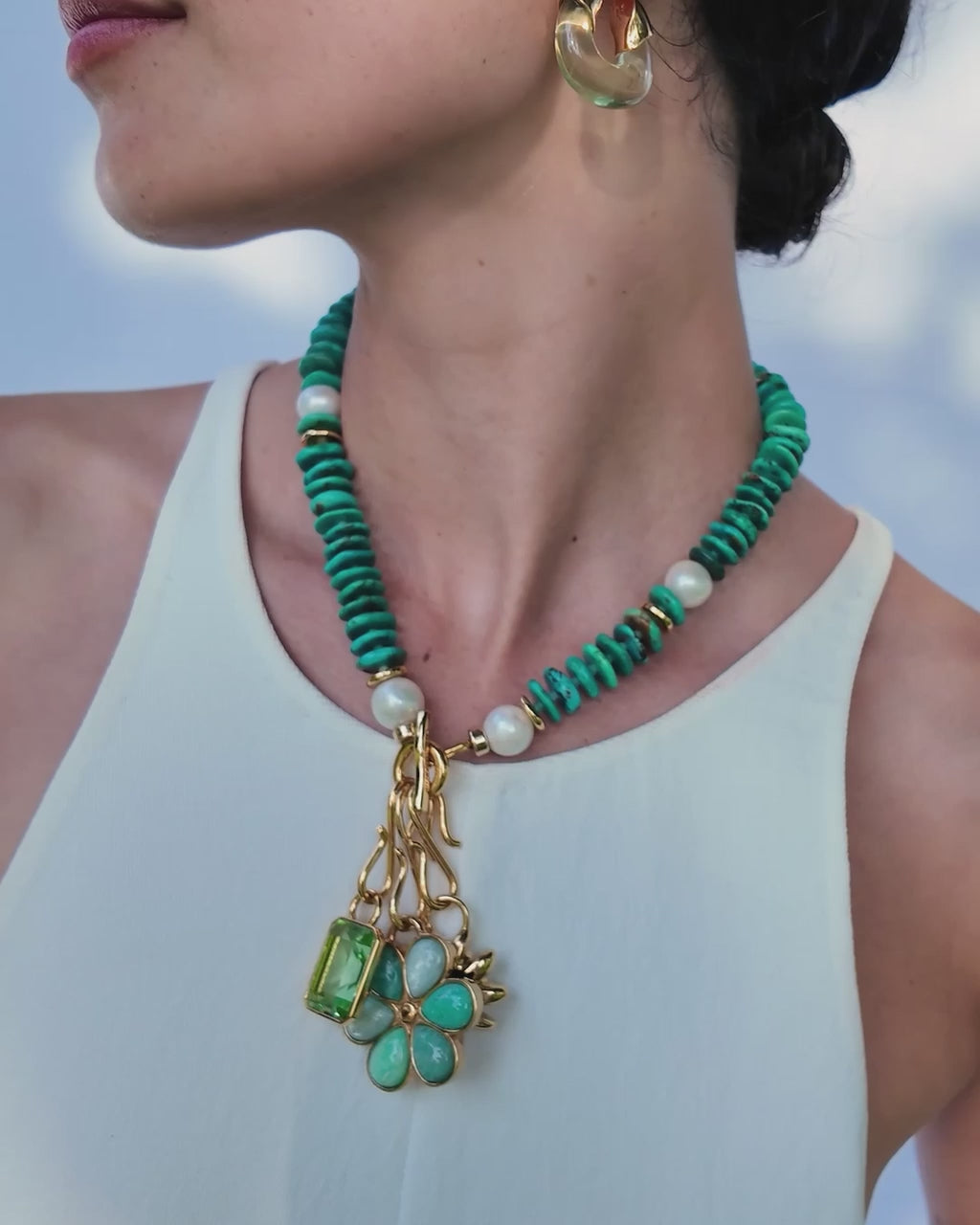 Video of model wearing white tank with Mood Necklace in Turquoise and assorted charms