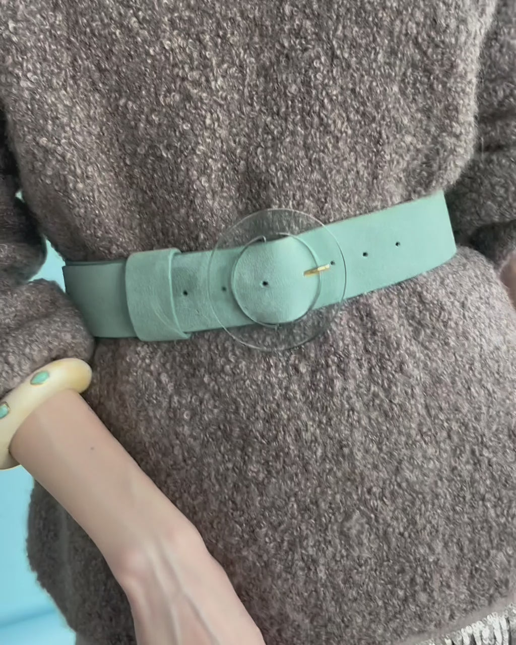 Video shows close-up of model wearing Ridge Cuff In Alabaster and Amazonite.