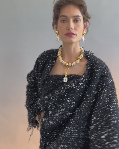 Video of model posing in black textured outfit with Ancient City Necklace, Interval Collar, and Rodan Pearl Earrings