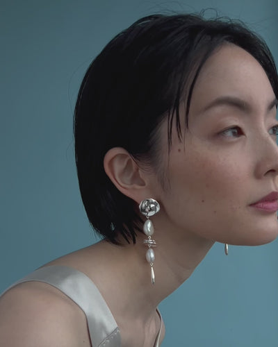 Close-up video of model wearing Silver Mine Earrings.