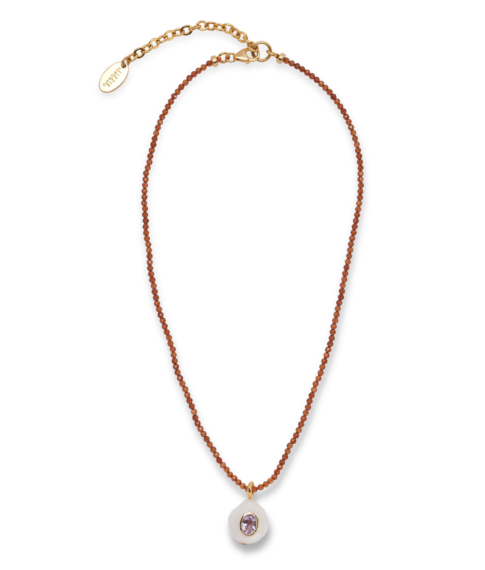 Castillo Necklace in Pearl. Small hessonite garnet beads and freshwater pearl charm inlaid with pink amethyst.