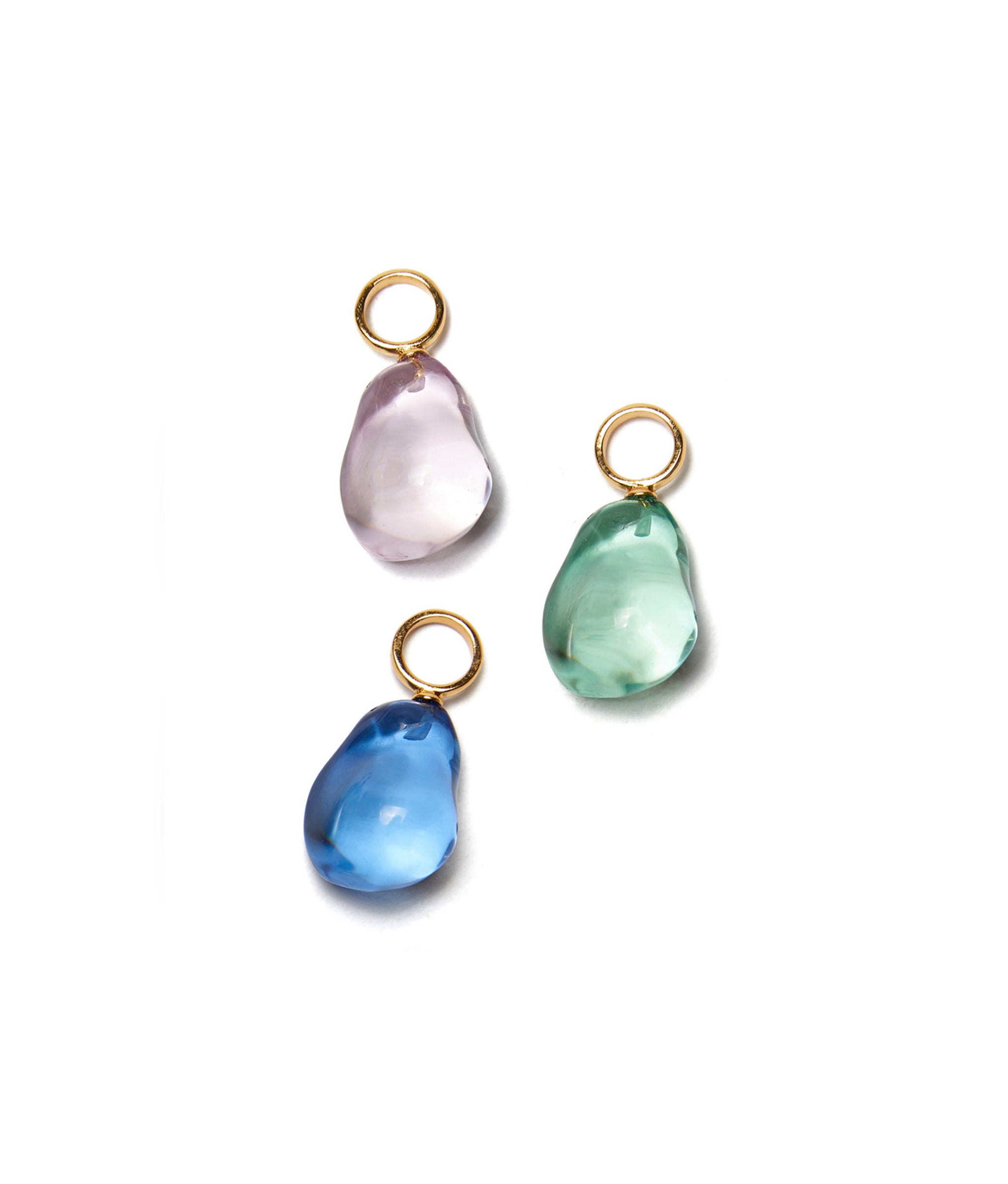 Island Hopper Charms in Lavender, Blue, and Moss. Charms in abstract pearl-shaped acrylic with gold-plated brass ring.