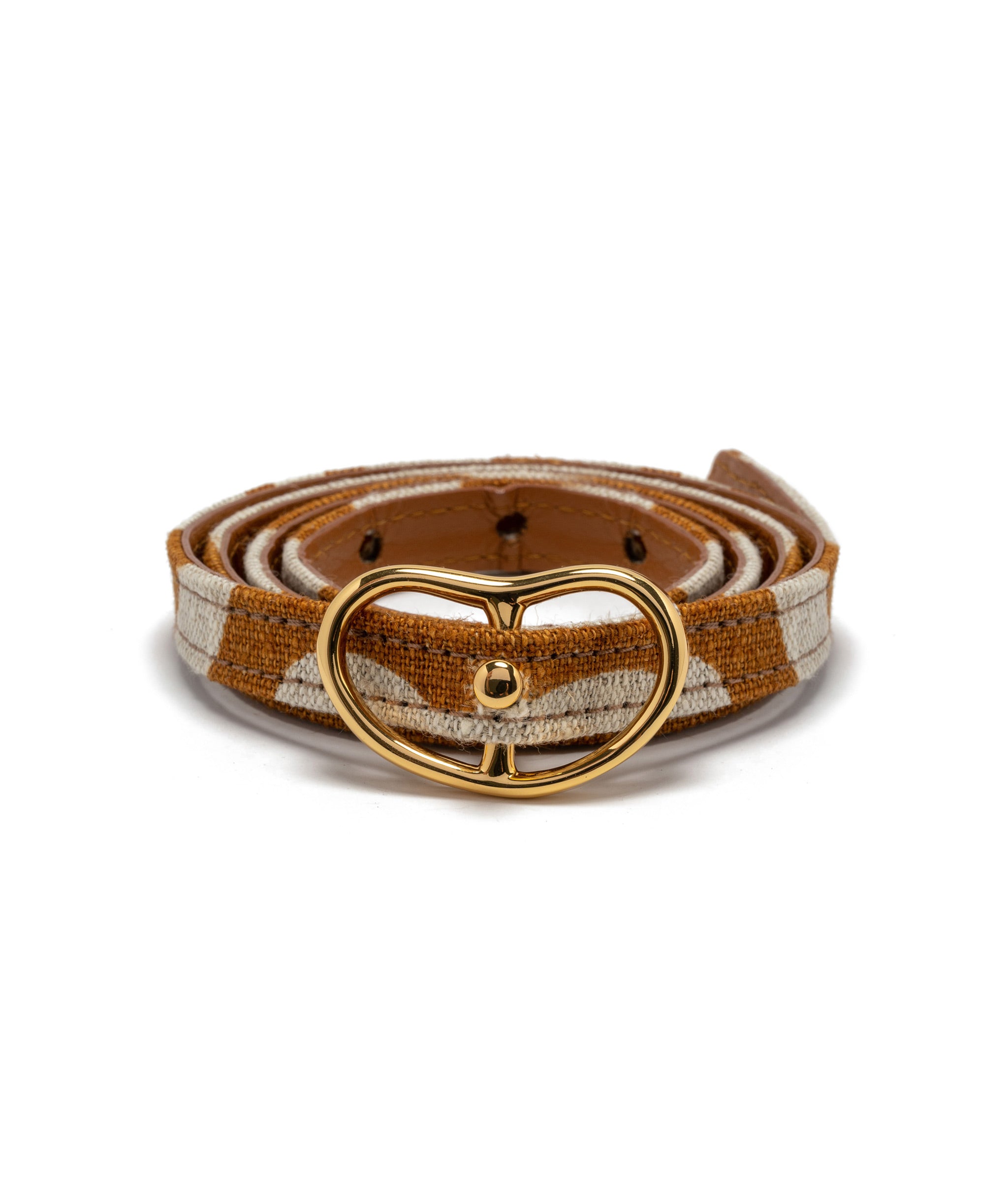 Skinny Georgia Belt In Bronze Zebra. Thin brown zebra print linen belt with gold-plated brass 'kidney' buckle. 