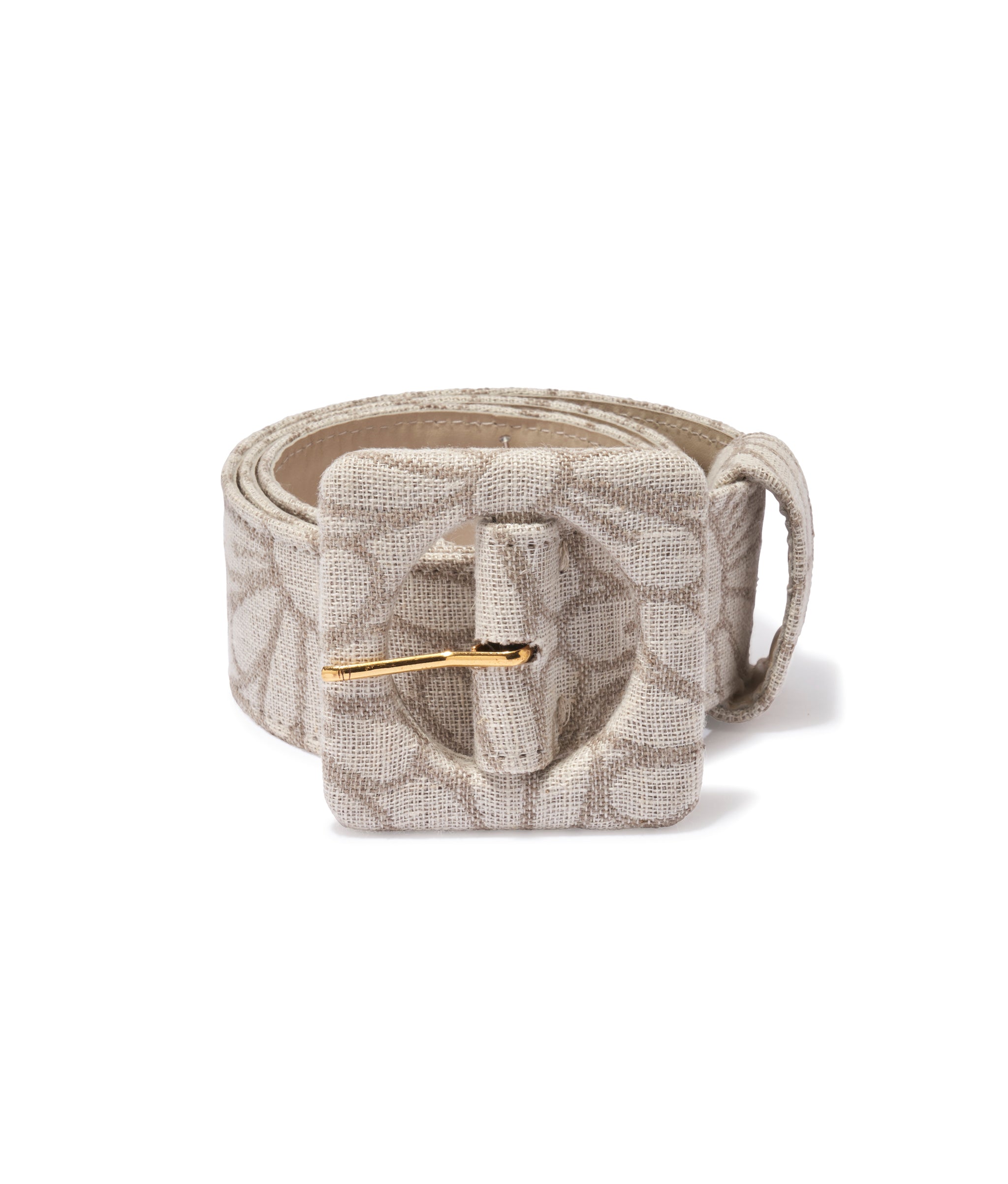 Agnes Belt in Daisy Linen. Rolled up fabric-covered belt in tan with tone-on-tone floral print and square buckle.