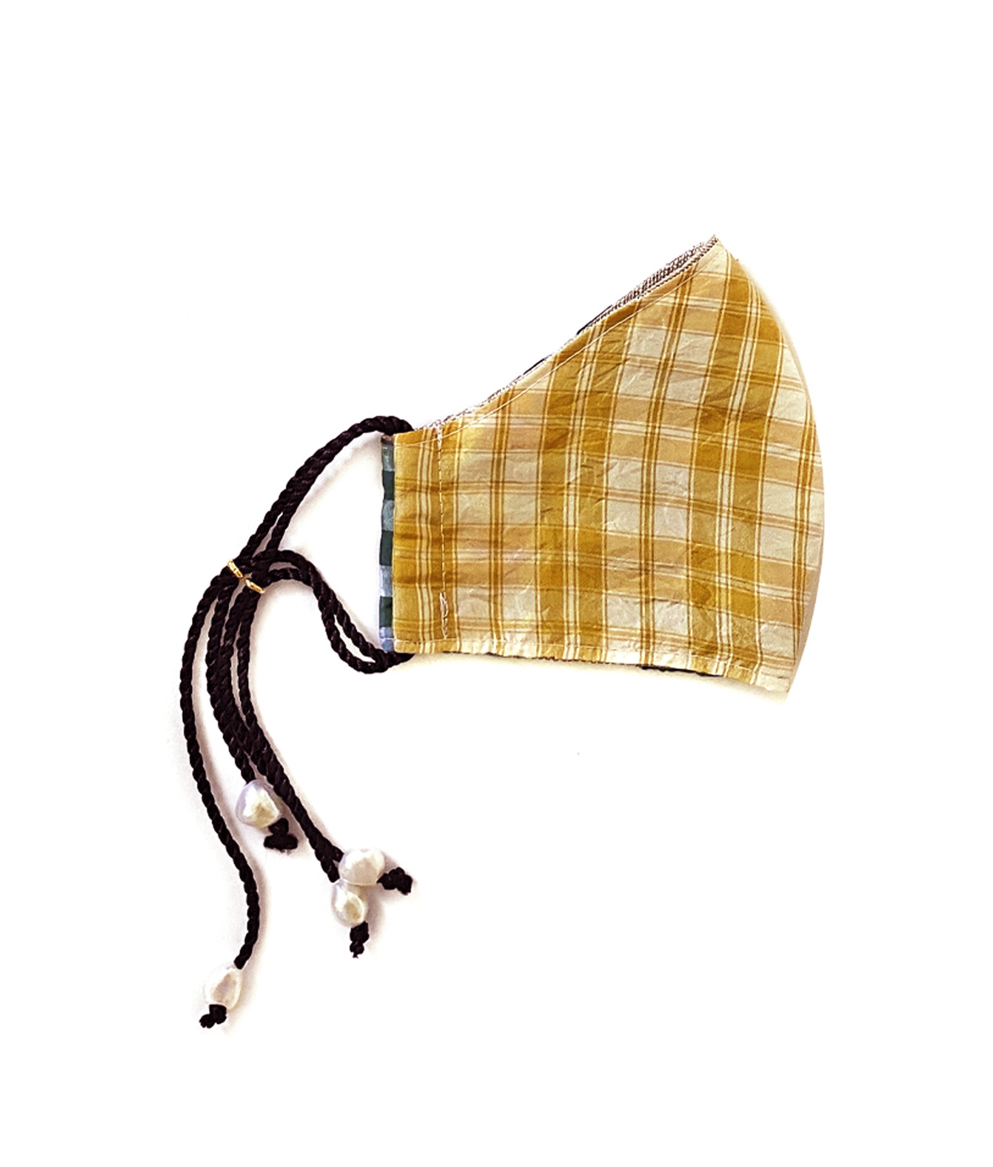 Side view of Face Mask in Picnic showing yellow plaid silk fabric with black cord straps and freshwater pearl details.