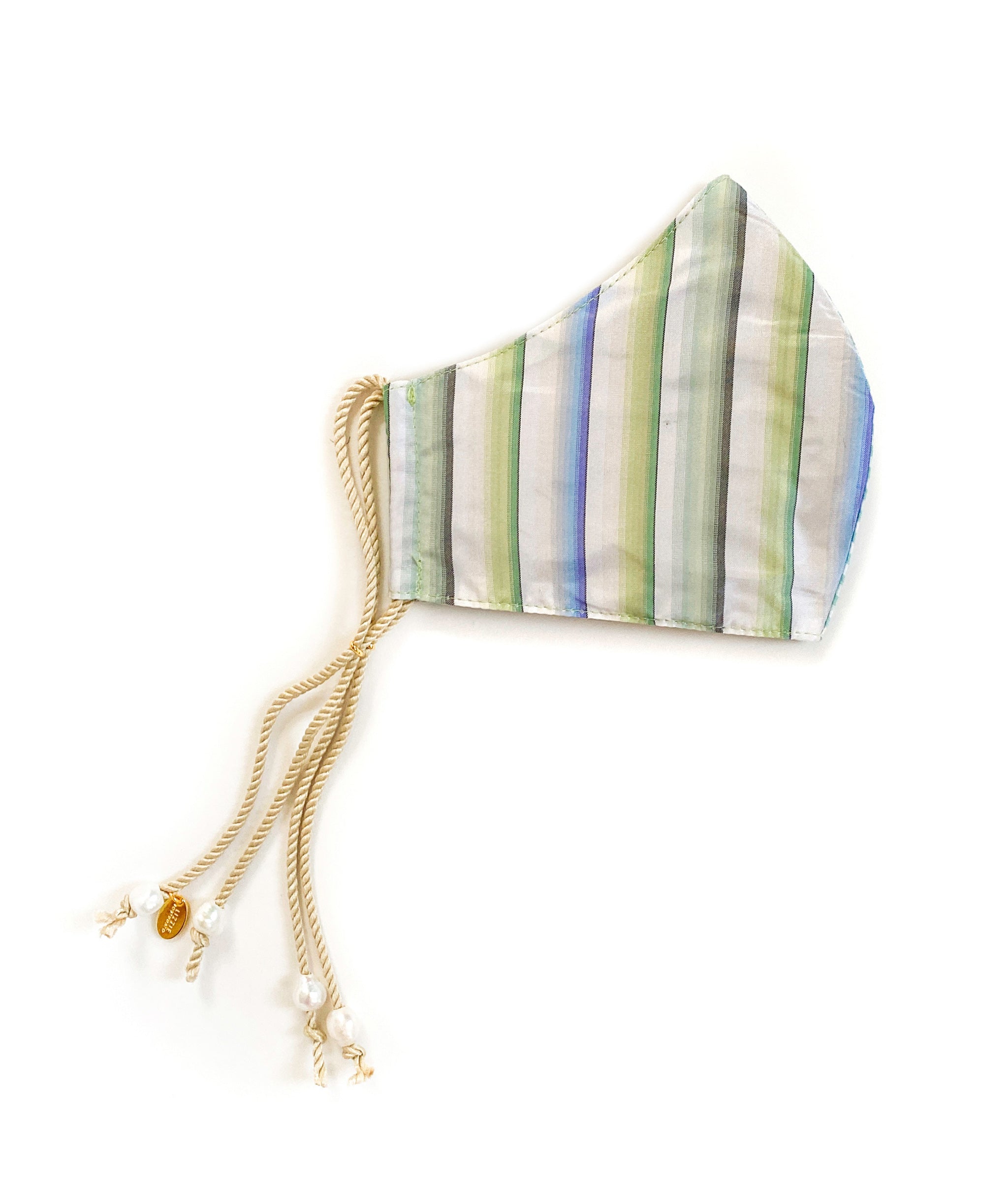 Side view of Face Mask in Palma showing cool-tone striped cotton with beige cord straps and freshwater pearl details.