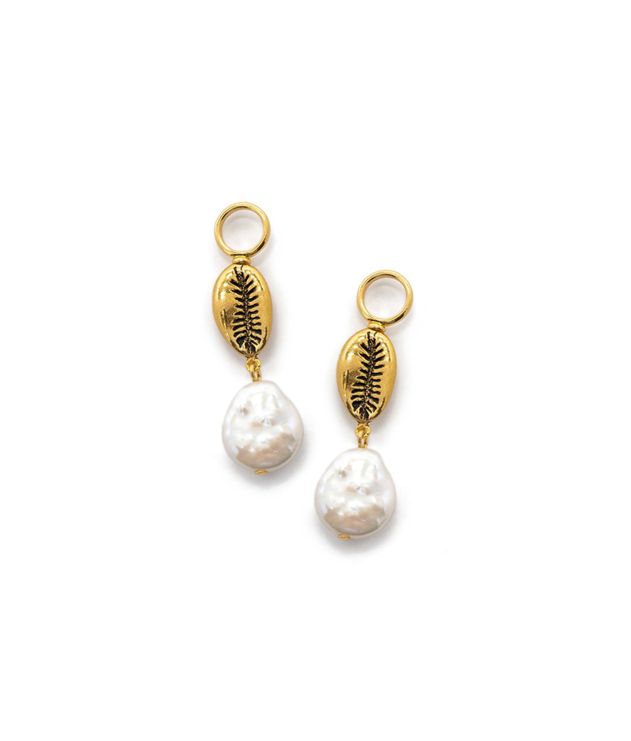 Tiny Treasure Charm. Two charms with antique brass shell, cultured pearl drop and gold-plated brass ring.